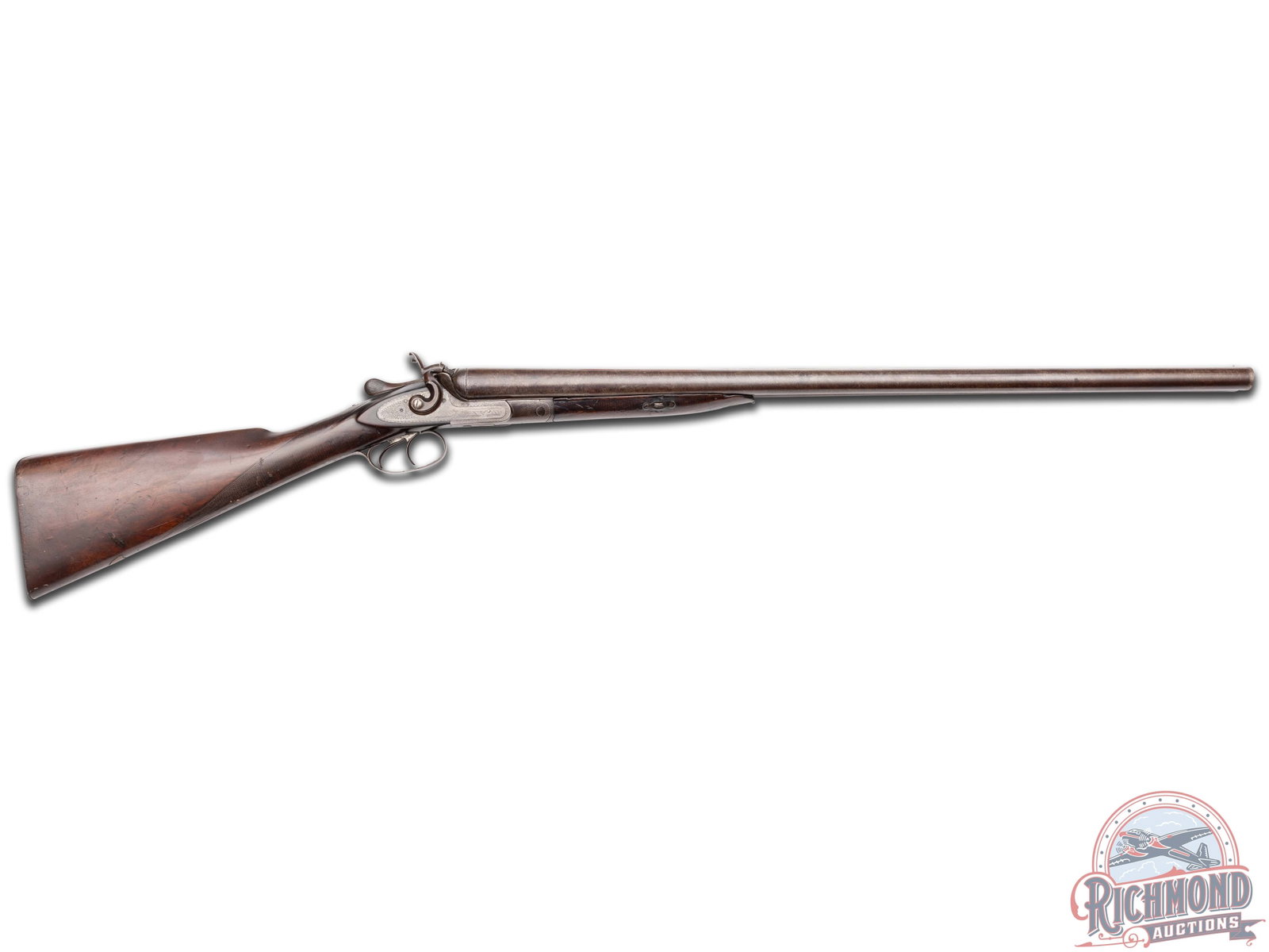Antique Engraved J.P. Clabrough & Bros 10 Gauge Hammer Double Barrel Shotgun: This antique shotgun features 28" Damascus steel SxS barrels with solid rib and single brass bead front sight. Equipped with extractors. Receiver features an engraved hunting scene with dog and duck o