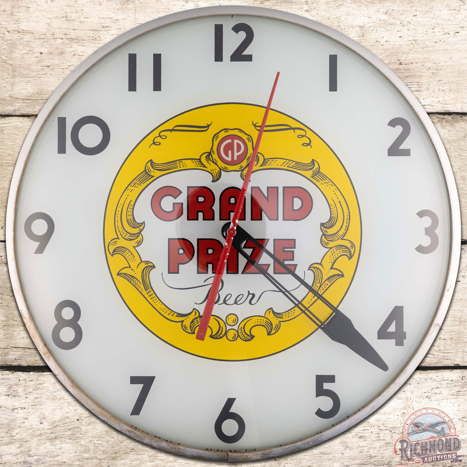 Grand Prize Beer 15" Telechron Advertising Clock w/ Logo: Excellent Telechron advertising clock runs and lights up as it should. The inner face is clean. The second hand has small paint chips and the outer glass has minor scuffs. The trim ring and can have l