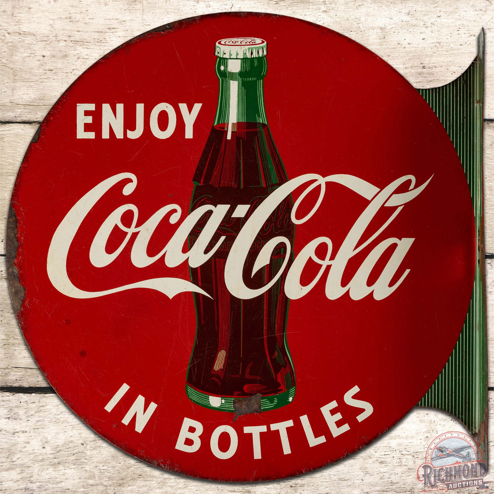 1954 Enjoy Coca Cola in Bottles DST Flange Sign w/ Bottle: DST (Double Sided Tin) Coke flange has good color and shine. The display has general wear in the field with a large paint chip on the bottles lower edge. The perimeter and inner flange have oxidation