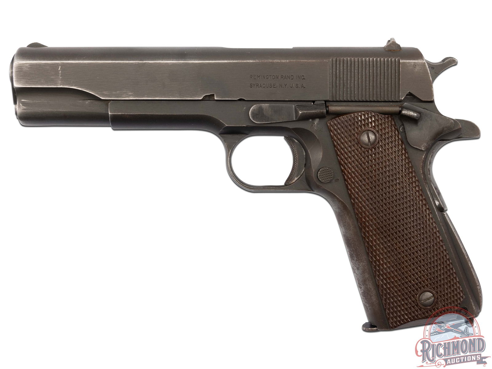 1943 Remington Rand M1911 A1 US Army .45 ACP Semi-Automatic Pistol: Manufactured in 1943 by the Remington Rand typewriter company for War relief efforts. This M1911 features a 5" barrel, standard rear notch and ramp iron sights. Parkerized matte finish throughout. Gri