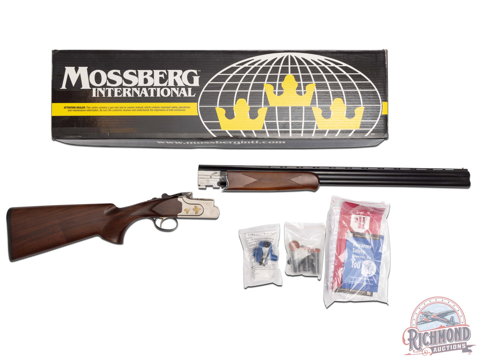 Like New Mossberg Silver Reserve 20 Gauge Boxlock Over / Under Shotgun: Features 26" ventilated blued barrels with brass bead front sight, extractors, chambered for 3" shells with screw-in choke tubes. Boxlock action has a coin finish with tasteful engraving and a pair of