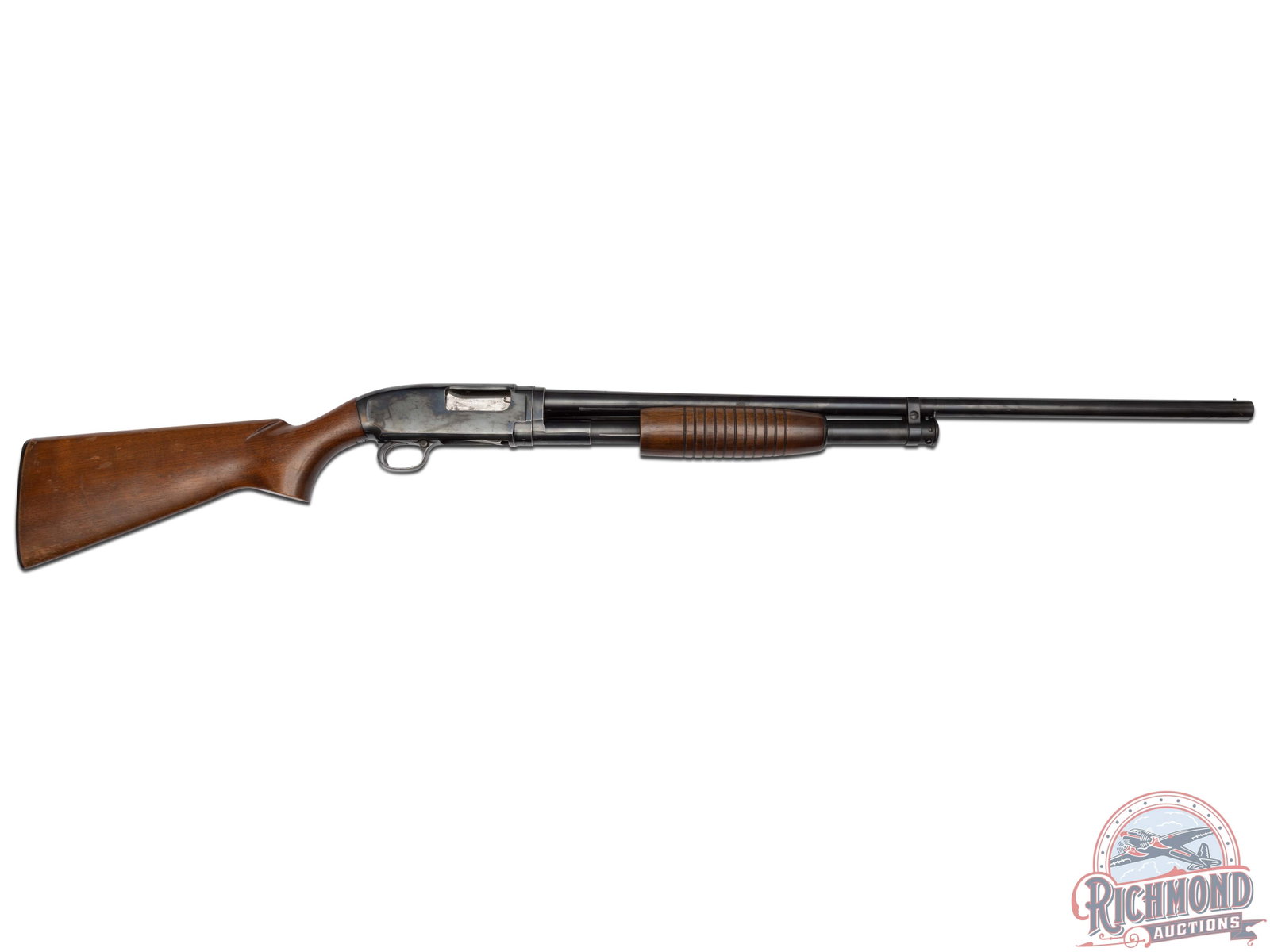 1961 Winchester Model 12 16 Gauge Pump Action Shotgun: Manufactured in 1961, this shotgun features a 28" blued barrel chambered for 2-3/4" shells with Modified choke and nickel bead front sight. Rear notch sight with matte rib. Matching serial numbers on 