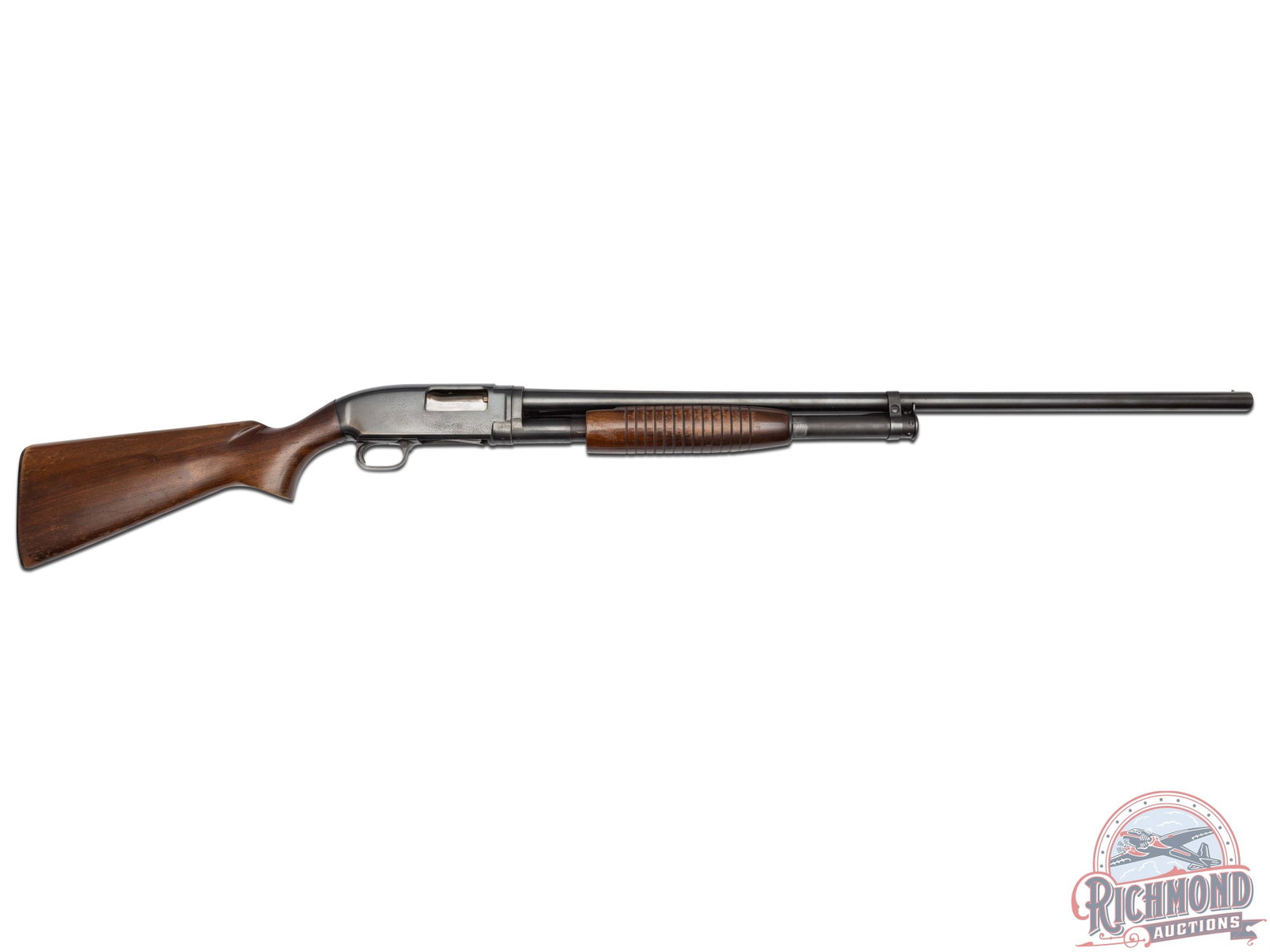 Pre '64 Winchester Model 12 Pump Action 12 Gauge Shotgun 30" Barrel: Manufactured in 1961, this model 12 features a 30" blued barrel chambered for 2-3/4" shells with a Full choke and nickel bead front sight. Blued receiver with notch rear sight with matte top. Crossbol