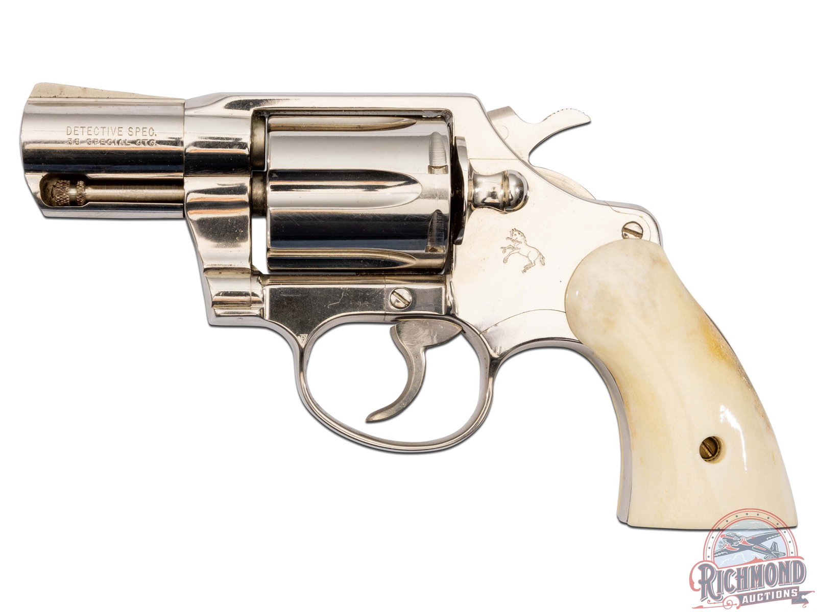 1974 Colt Detective Special .38 Special 2" Nickel Double Action Revolver: Manufactured in 1974. Features a 2" barrel with ramp front sight and integrated notch rear sight. Complete nickel finish. Left side of the barrel is stamped "DETECTIVE SPEC. / 38 SPECIAL CTG.", right 