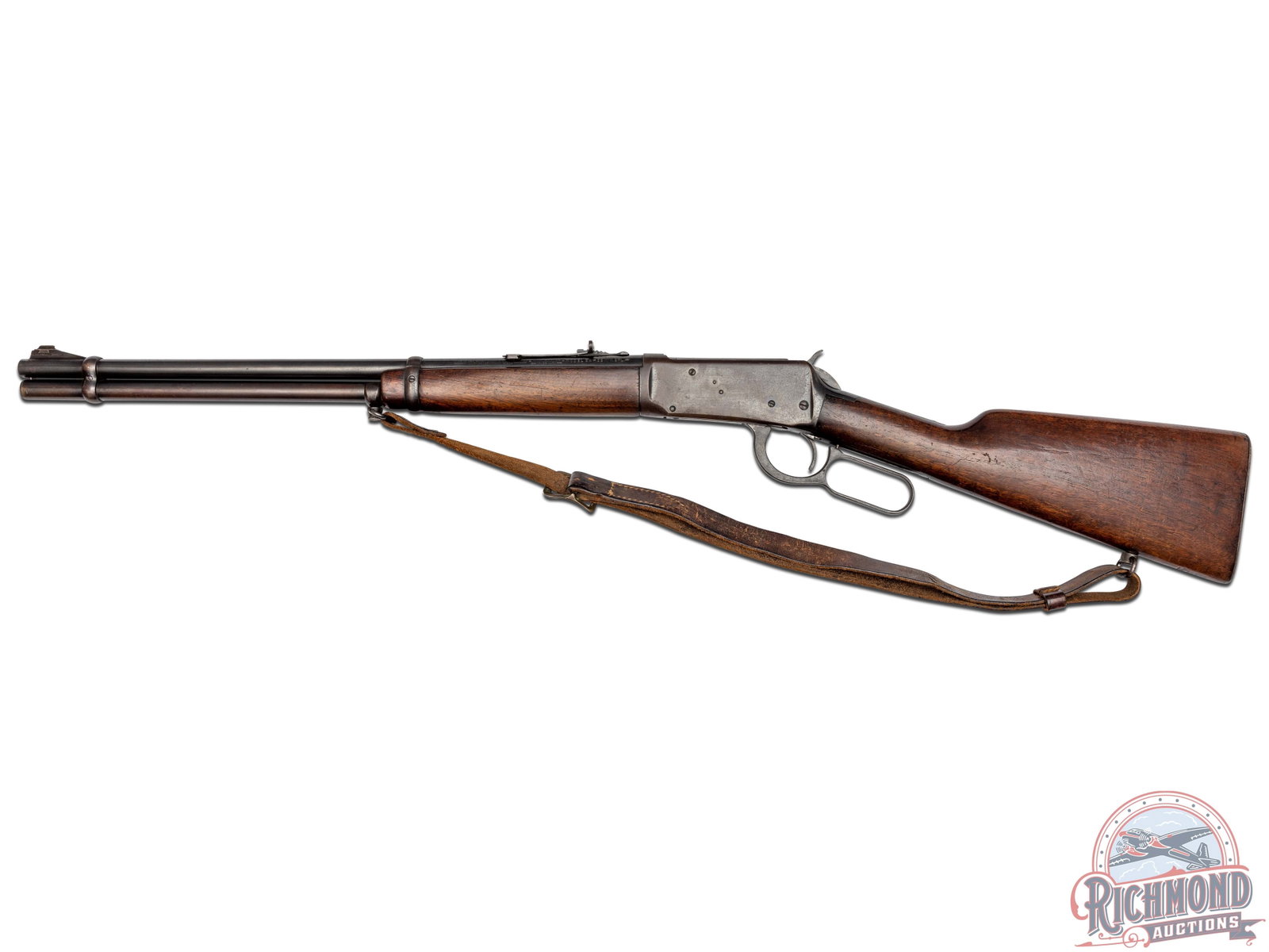 1952 Winchester Model 94 .32 WIN SPL Lever Action Rifle: This pre-'64 rifle features a 19.5" carbine barrel, full length magazine tube, ramp blade front sight and buckhorn adjustable rear sight. Barrel and receiver stamped with standard Winchester proof mar