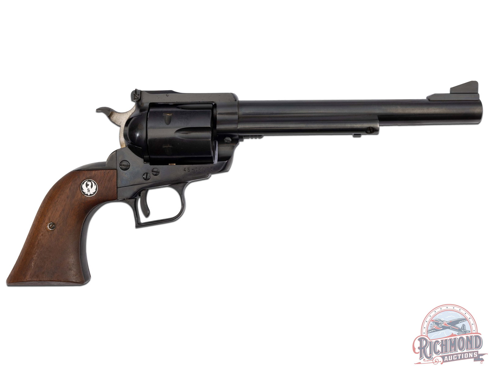 Ruger Blackhawk .45 Colt Three Screw Single Action Revolver: Features a 7.5" barrel with ramp front sight and rear adjustable notch sight. Early three screw frame. Blued finish with six round fluted cylinder. Factory walnut Phoenix logo grips. CALIBER: 45 Colt.