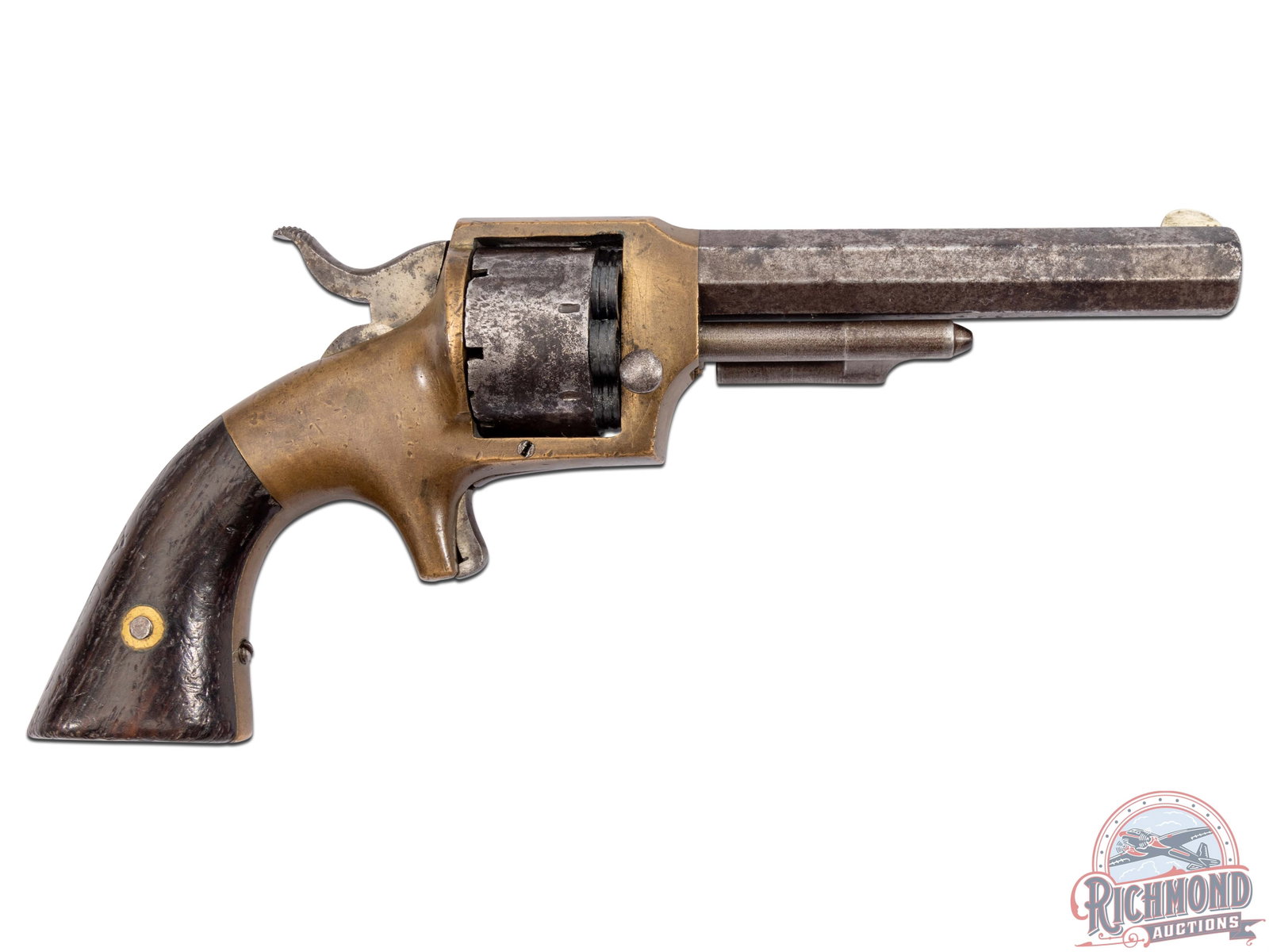 L.W. Pond 32 Caliber Revolver: Made circa 1863. 3.5"octagon .32 caliber maker marked barrel with blade front sight. Brass frame with steel 7 shot cylinder. Walnut 2 piece grips. CALIBER: 0.32. S/N: 476. FFL STATUS: Antique.
