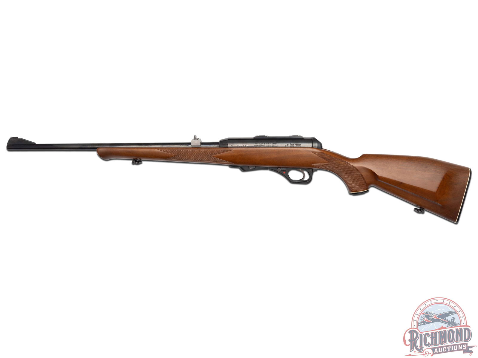 German Proof H&K Heckler & Koch HK 300 .22 WMR Semi-Automatic Rifle: This German proof stamped H&K features an 19" blued barrel with a rear notch sight and front ramp blade sight. The left side of the barrel is marked ?.22 WMR? in front of Eagle N and Ulm German proof