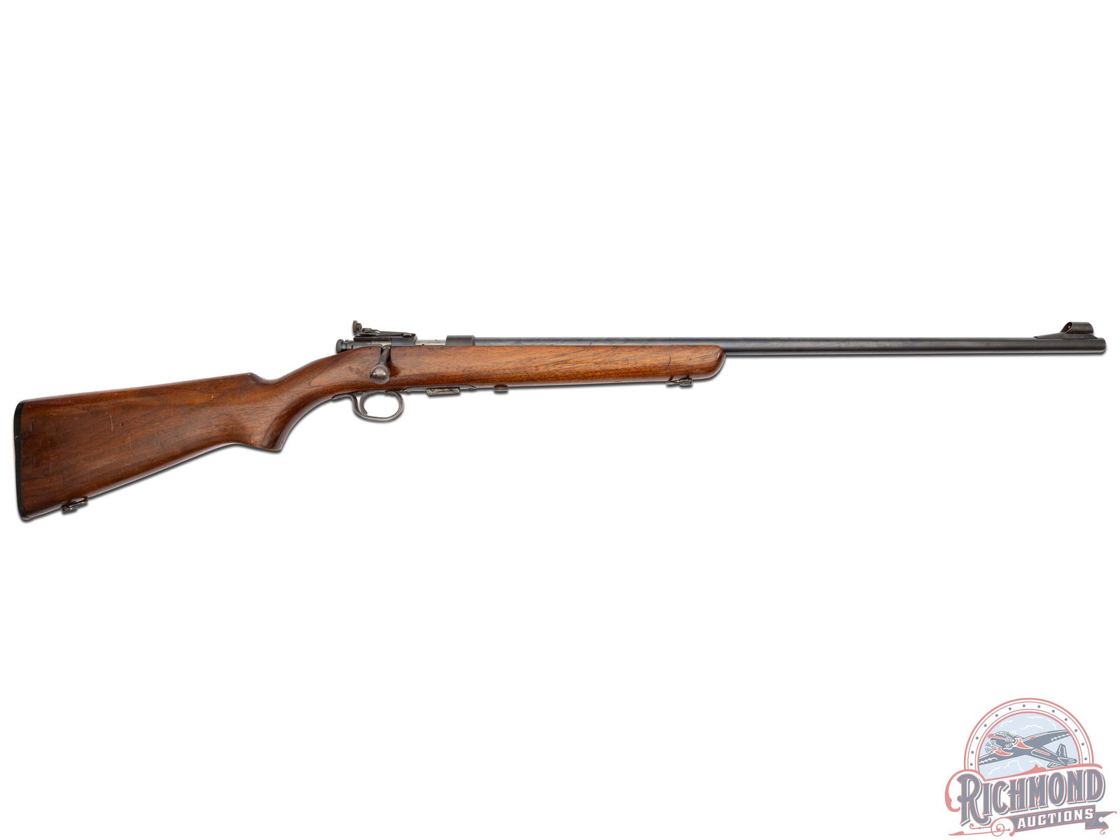 Winchester Model 69 Bolt Action .22 Rimfire Rifle: Made in circa 1935. 24" blued round Winchester Proof Steel barrel with standard sights. Blued bolt action with Winchester detachable magazine. Standard walnut stock. CALIBER: . 22 S/L/LR. S/N: n/a. FF