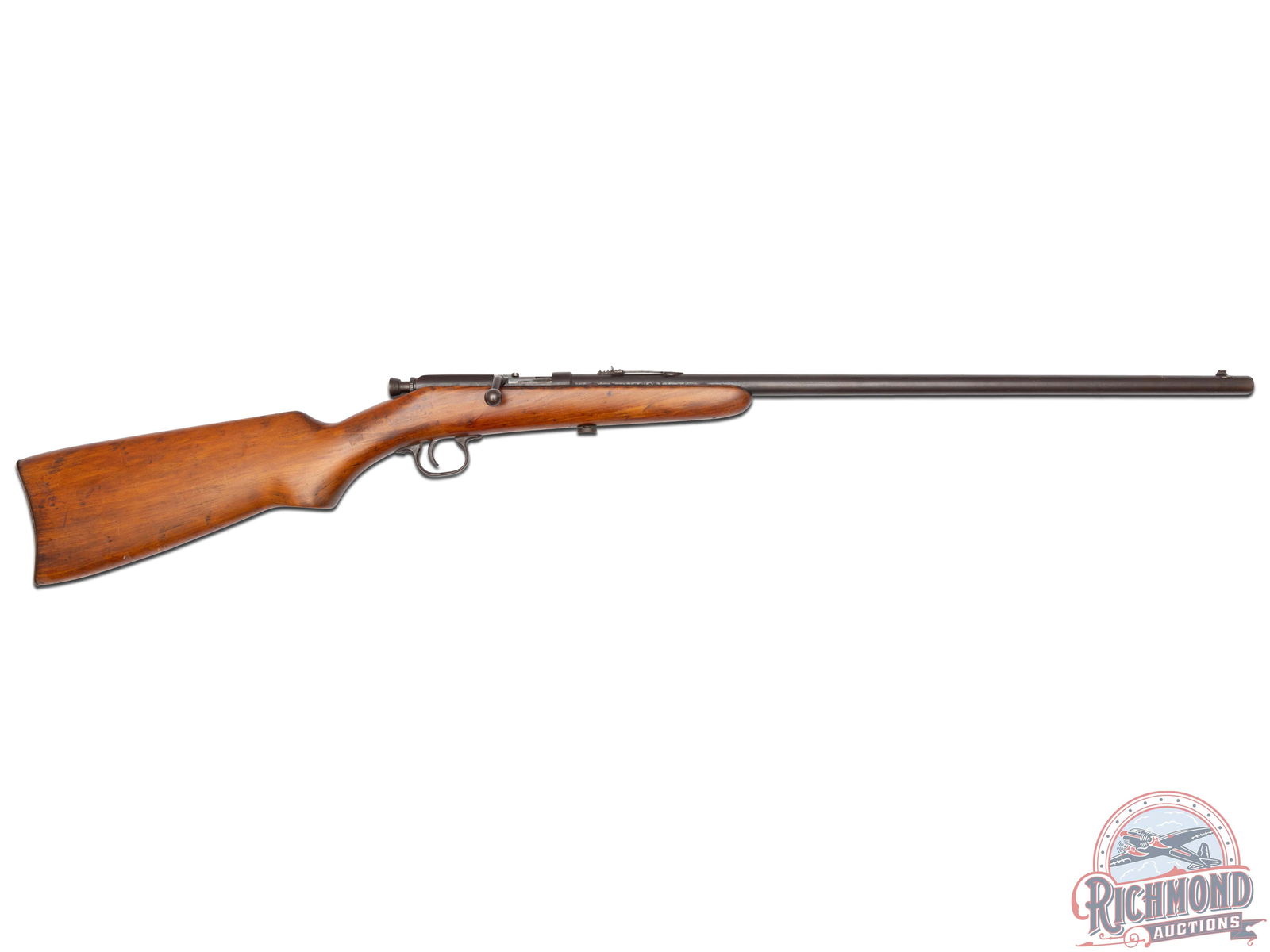Mossberg & Sons .22 Short/L/LR Single Shot Bolt Action Rifle: Made in America, no serial number found, predate requirements. This single shot rifle features a 22" barrel, rear notch sight and blade front sight. Straight grain wood stock with metal Butt plate and