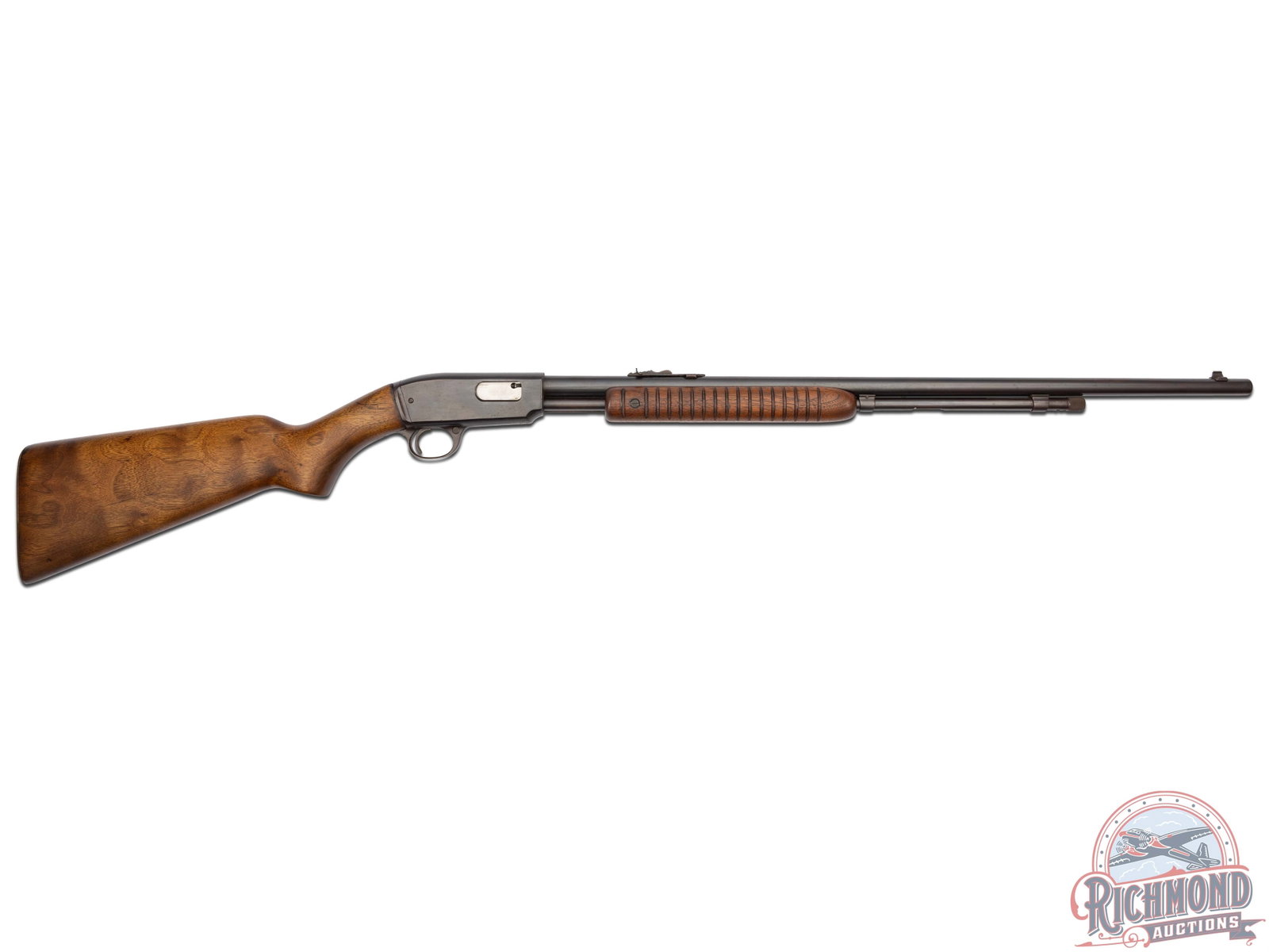 Winchester Model 61 .22 Caliber Slide Action Rifle: Made in 1953. 24" blued round Winchester Proof Steel barrel in .22 S, L, & LR caliber with standard sights. Blued takedown receiver. Walnut standard stocks. CALIBER: . 22 S/L/LR. S/N: 187744. FFL STAT