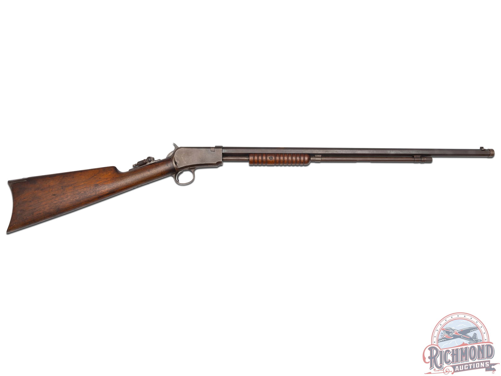 Winchester Model 90 .22 WRF Slide / Pump Action Rifle: Manufactured in 1940, this rifle features a 24" octagon threaded barrel with blade front sight. Chambered in 22 Winchester Rimfire. Original rear sight has been removed and fitted with a brass insert.