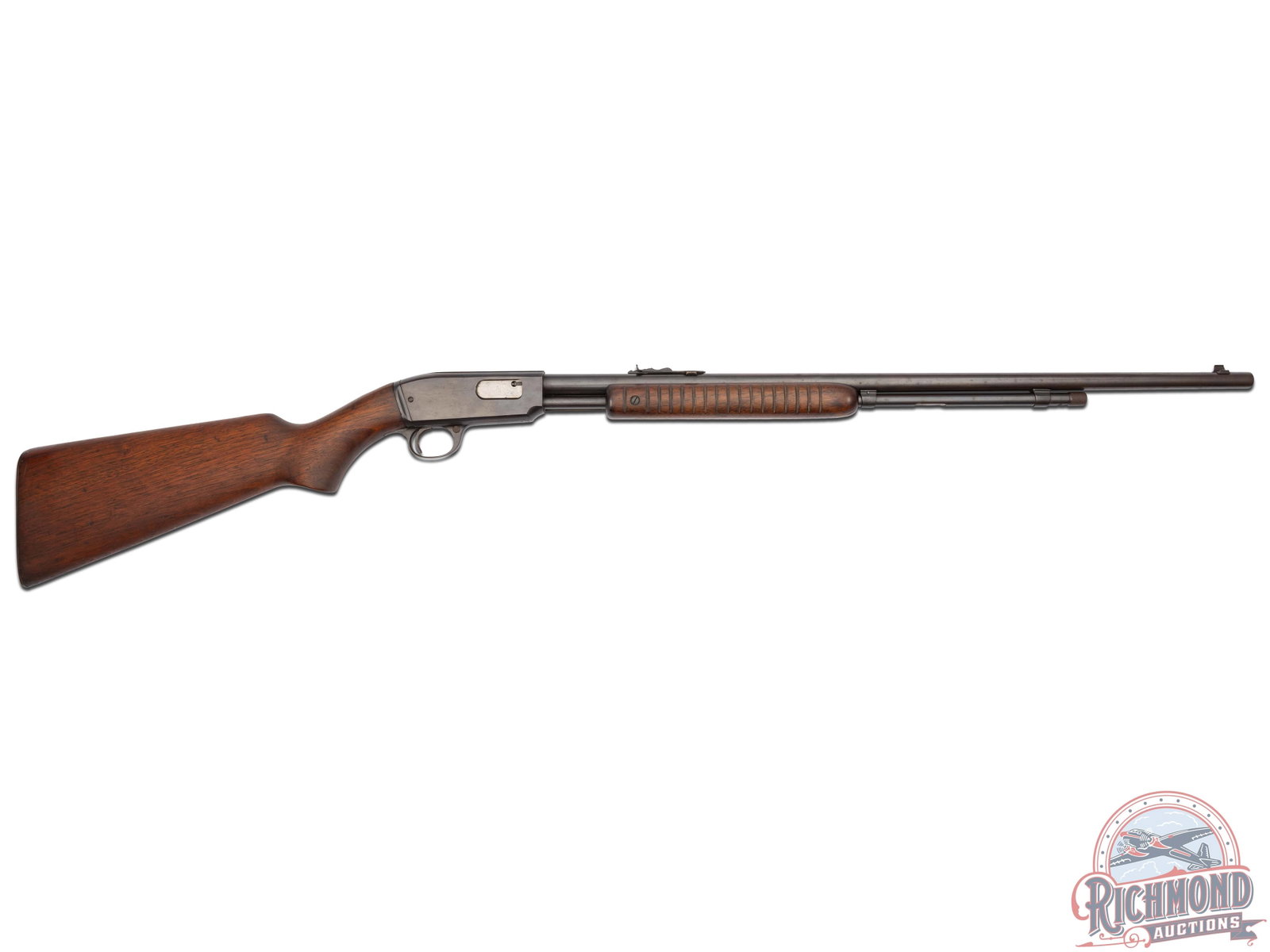 Winchester Model 61 .22 Caliber Slide Action Rifle: Made in 1952. 24" round blued Winchester Proof Steel barrel with standard sights in .22 S, L, & LR caliber. Blued takedown grooved receiver frame. Walnut standard stocks with checkered steel Butt plat