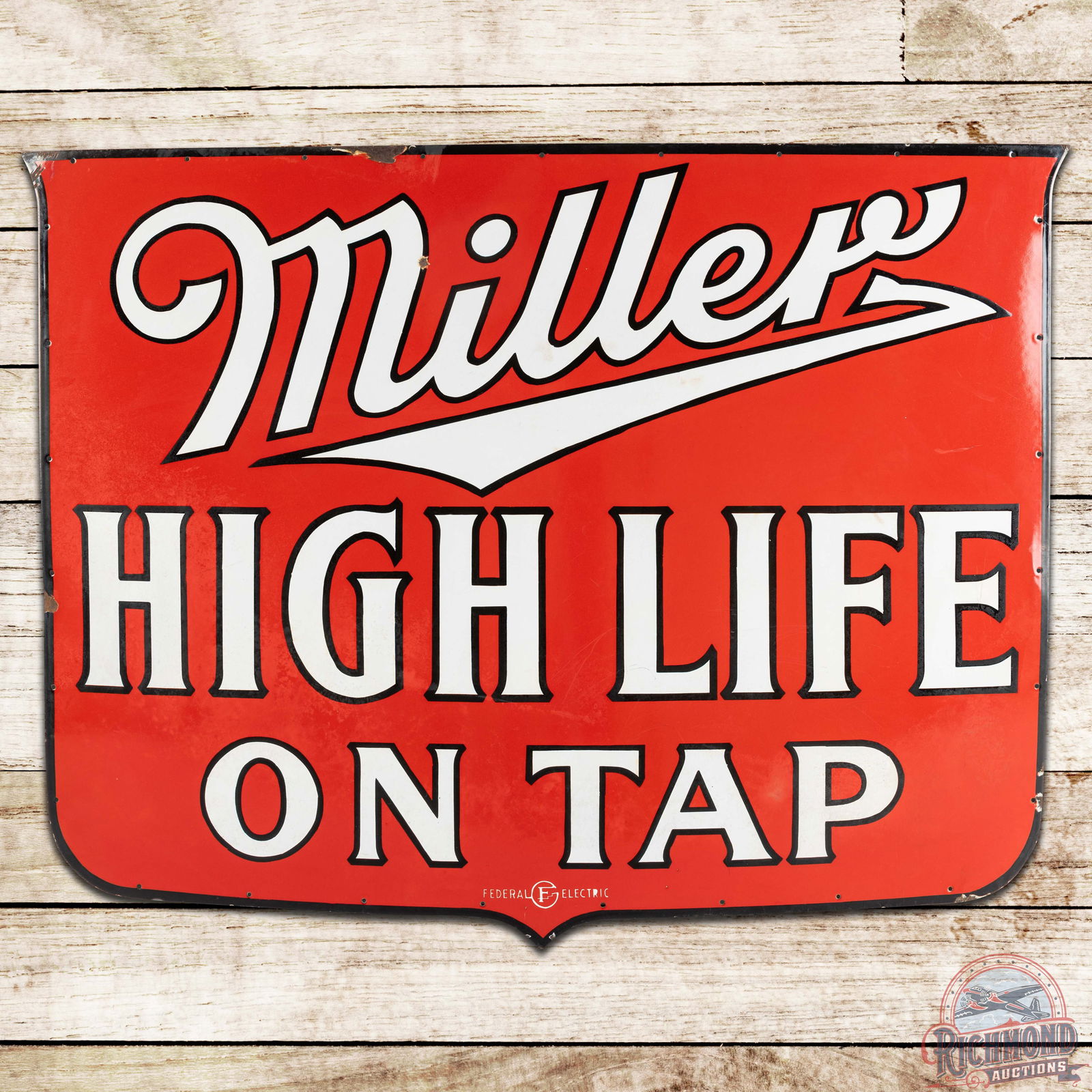 Miller High Life Beer on Tap Die Cut SS Porcelain Sign: SSP (single sided porcelain) die cut sign has very good color. The field has light surface wear with areas of discoloration and low gloss. The upper field has one dime-sized chip in the "M". The perim