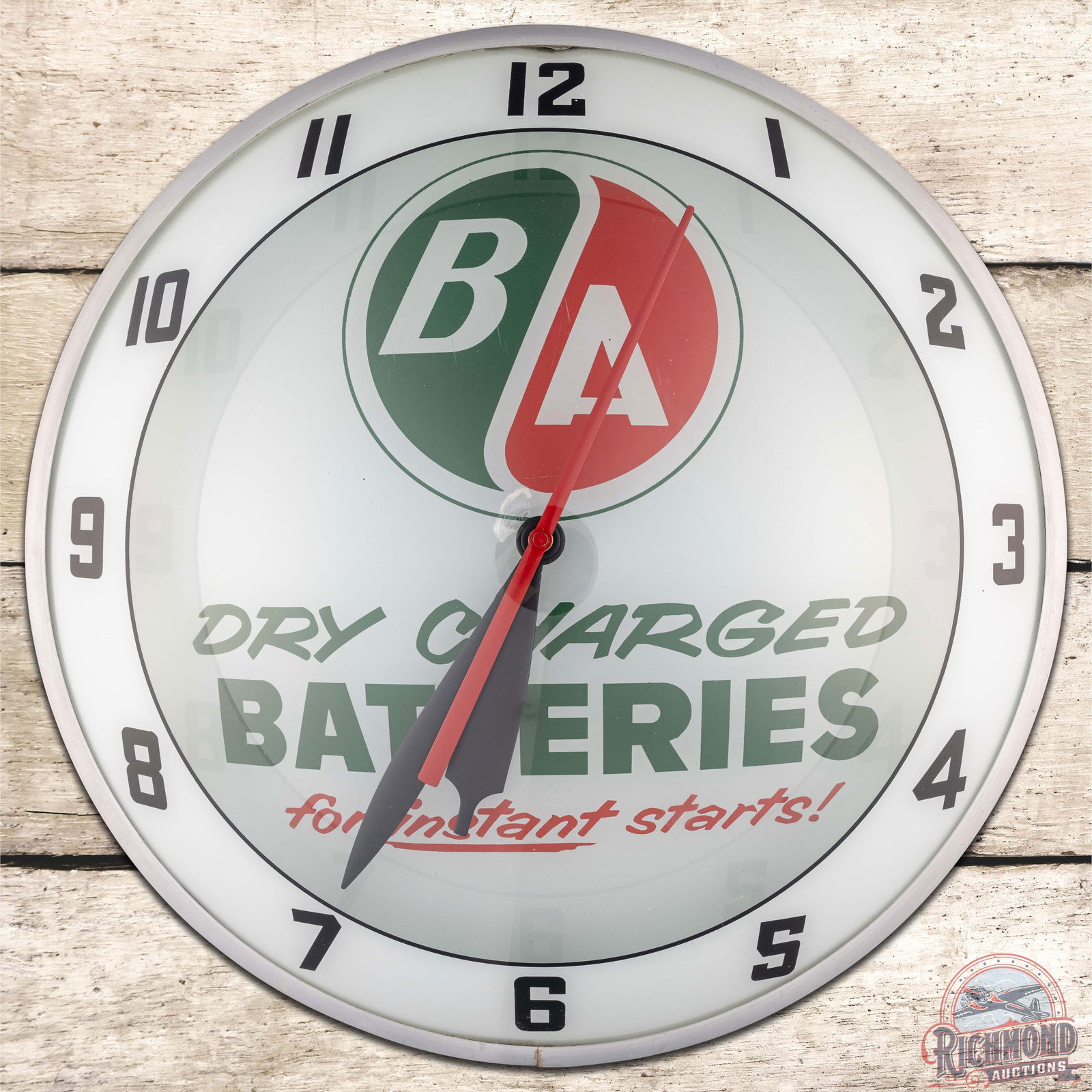 BA Dry Charge Batteries 15" Double Bubble Advertising Clock: Lighted double bubble clock runs and lights as it should. The clock has excellent color. The inner face has a chip with white paint near the stem opening and minor fine scratches on the outer face. Th