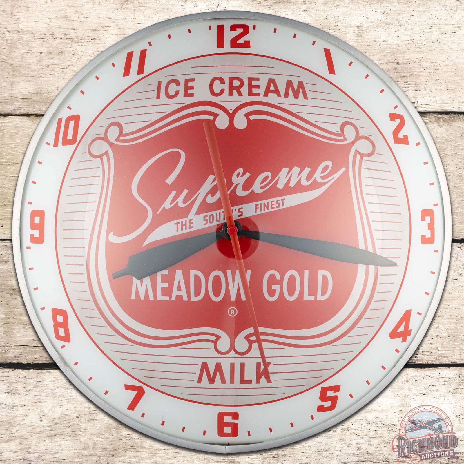 Supreme Meadow Gold "The South's Finest" Ice Cream Milk 15" Double Bubble Advertising Clock: Lighted double bubble clock runs and lights as it should. The inner and outer glass are clean with outstanding color. The outer glass has a small scratch in the white on the left side below the 7 o'cl