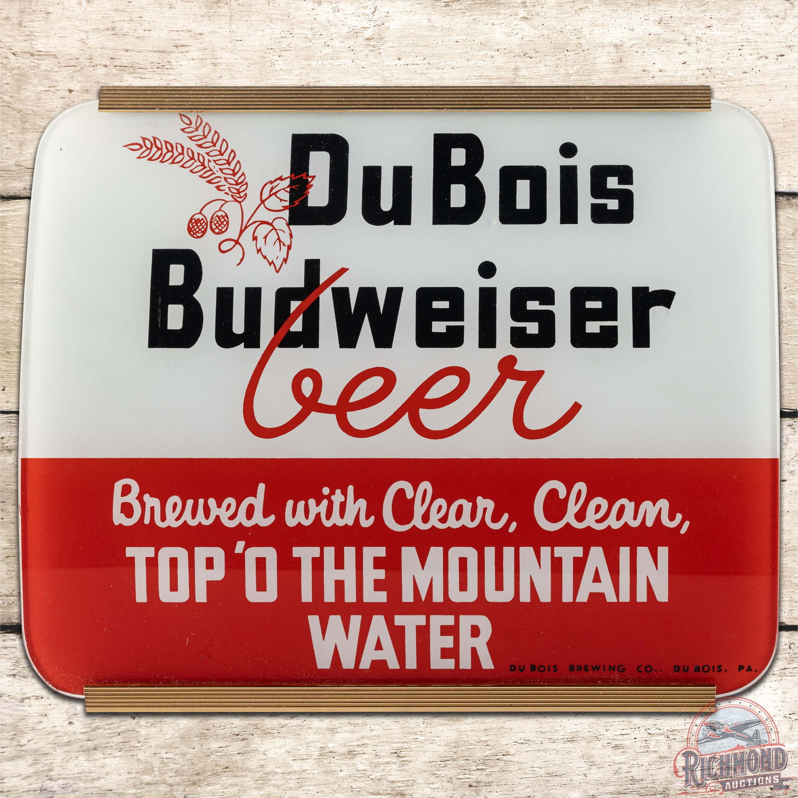 Dubois Budweiser Beer Lighted Countertop Advertising Sign: Reverse glass lighted countertop sign works as it should. The glass is clean with vivid colors. The metal can is in very good condition with minor wear and an Advertising Products, Inc. decal is prese