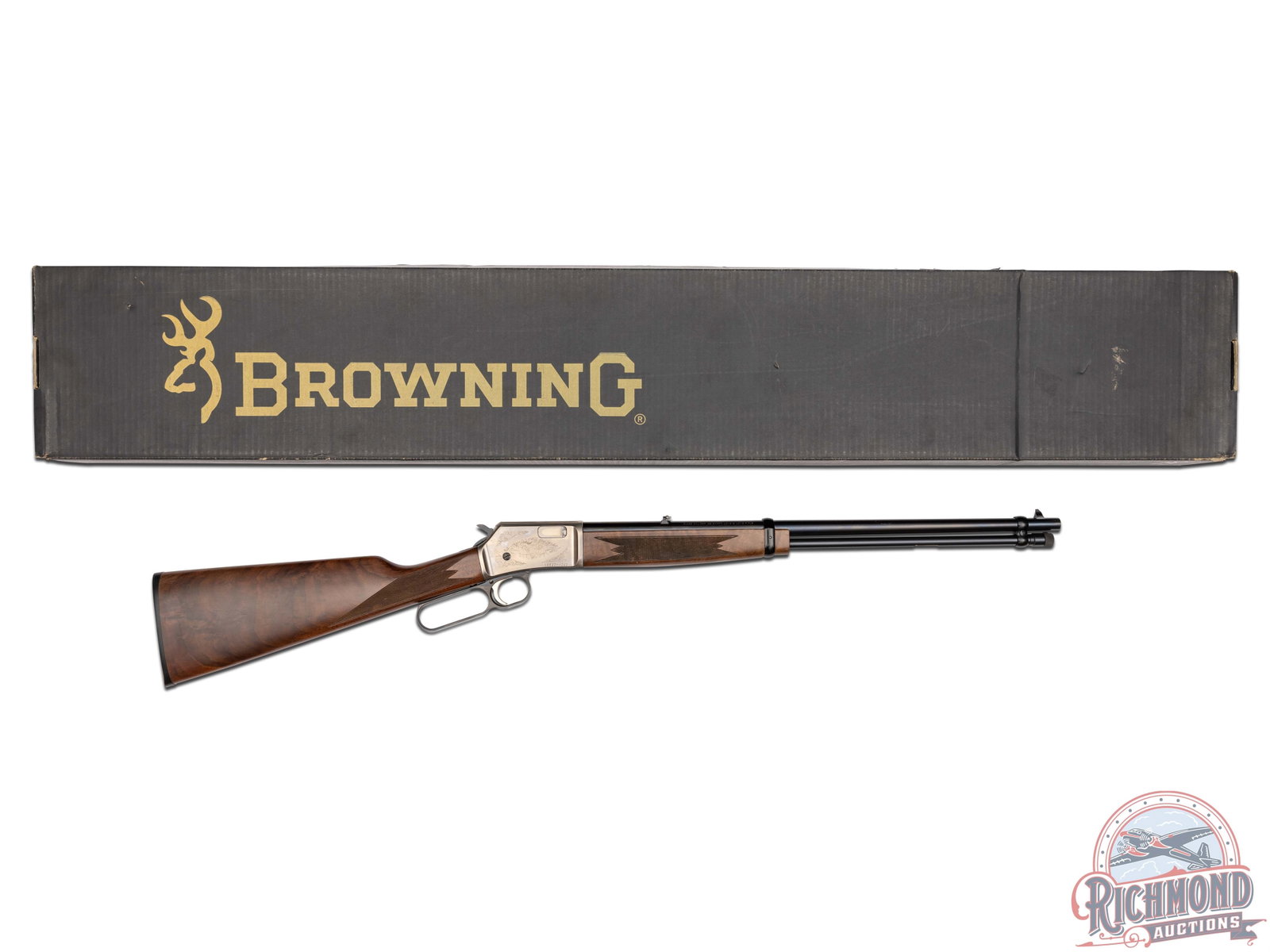 Browning BL-22 .22 S/L/LR Sporting Engraved Lever Action Rifle with Original Box: Manufactured in 2005. Features a 20"round blued barrel with full length magazine tube. flip-up rear adjustable notch sight and blade front sight. Coin finished receiver with fine floral scroll engravi