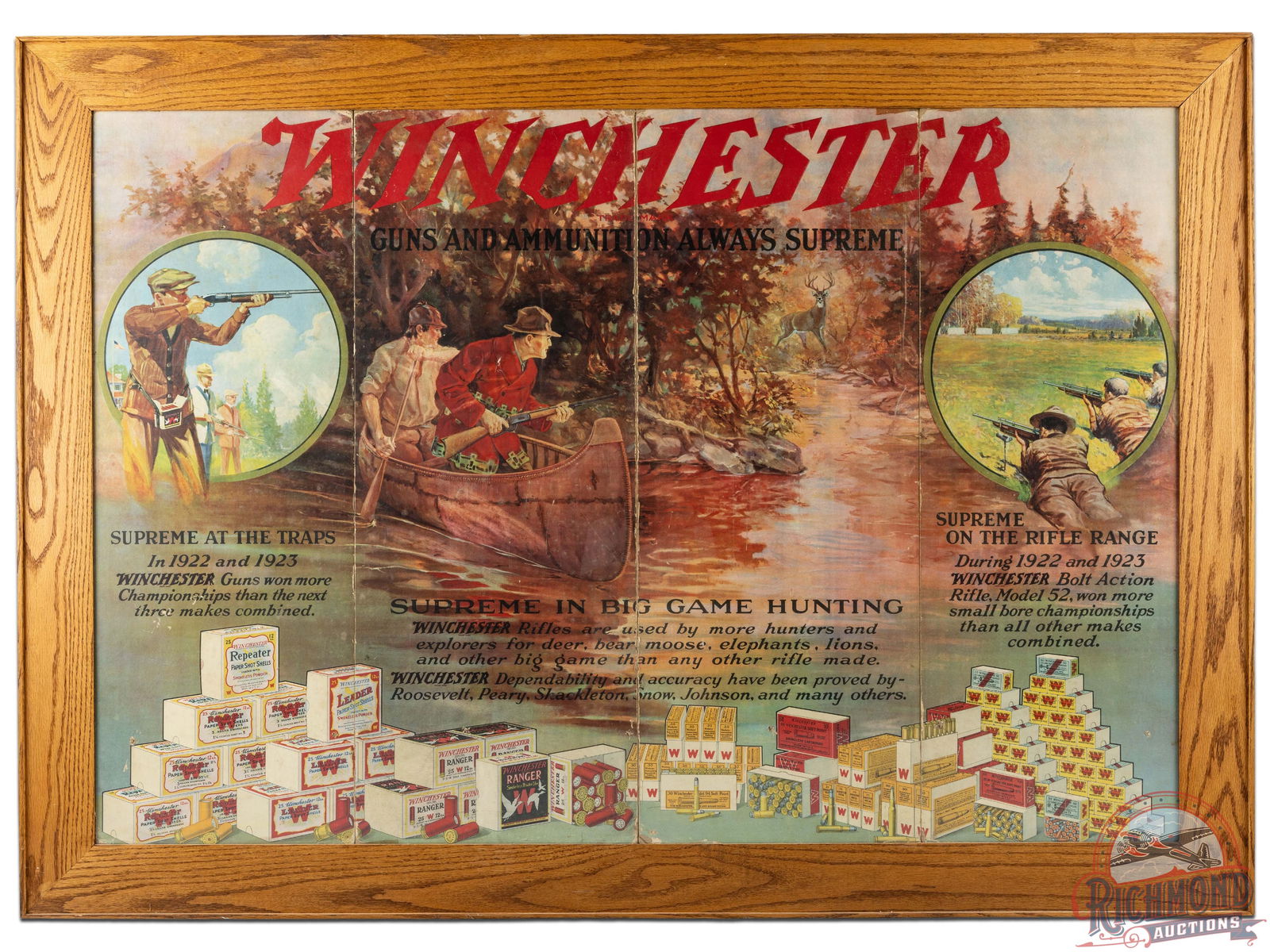 1924 Winchester "Two Deer Hunters In Canoe" Cardboard Store Display Sign: Large framed cardboard point of purchase display with excellent colors and graphics, circa 1924. Reads "Supreme on the rifle range, Supreme at the traps, Supreme in big game hunting" and touting Winch