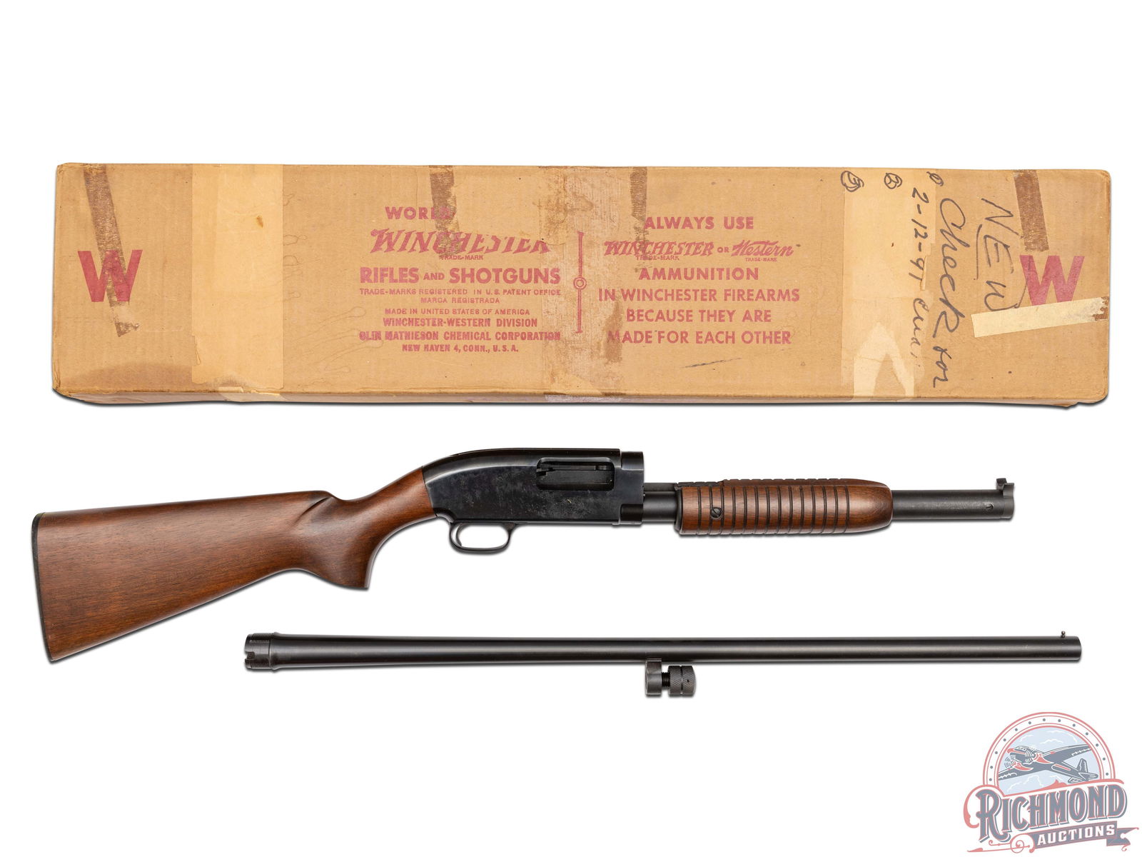 New Old Stock 1961 Winchester Model 12 Featherweight 12 Gauge Pump Action Shotgun in Original Box: Manufactured in 1961. This Featherweight shotgun features a 28" round blued barrel chambered for 2-3/4" shells with modified choke and nickel bead front sight. Blued receiver, 5 round magazine tube an