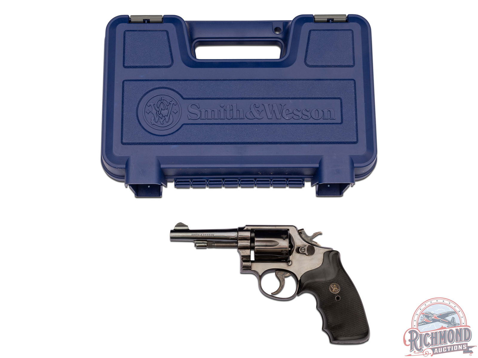 1975 Smith & Wesson Model 10-5 .38 SPL Double Action 4" Revolver: Manufactured in 1975. Features a 4" barrel with ramp front sight and rear integrated notch sight. Blued finish with a 6-round swing-out fluted cylinder. Case hardened trigger and hammer. Includes a Pa