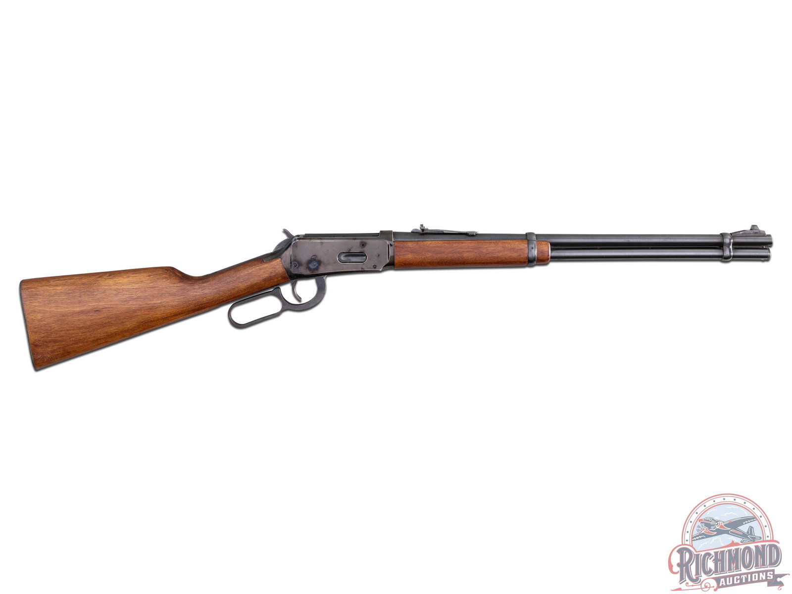 1968 Winchester Model 94 Carbine .32 WIN Special Lever Action Rifle: Manufactured in 1968. Features a 19.5" blued carbine barrel with rear adjustable notch sight and ramped blade front sight. Blued receiver with side loading gate. Walnut wood stock and matching forearm