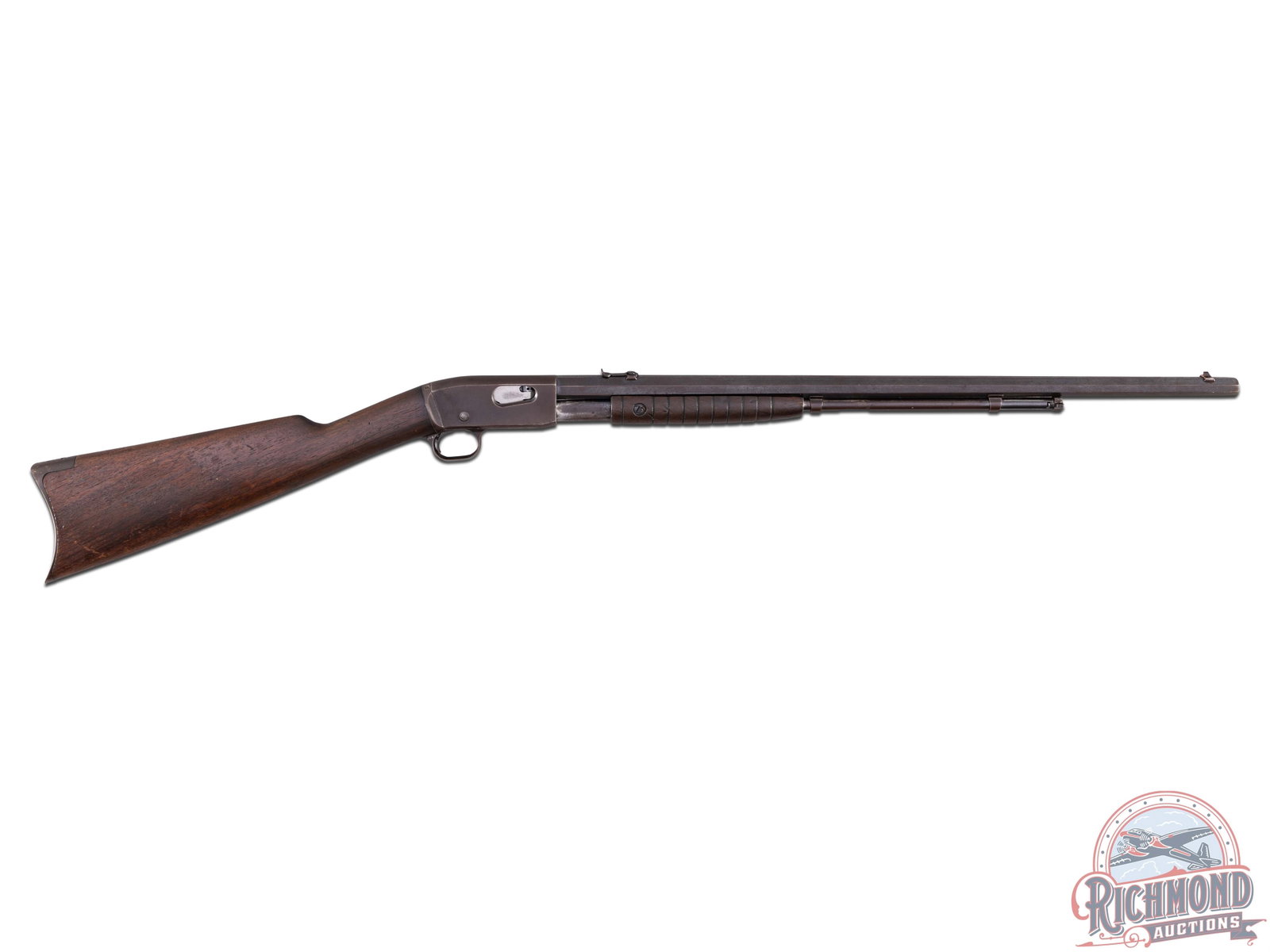 Vintage Remington UMC Model 12 Gallery Pump / Slide Action .22 Short / Long / LR Rifle: Manufactured circa 1915. This vintage rifle features a 23-1/2" octagon barrel with original rear notch and blade front sight. Top barrel flat is stamped with the two-line Remington Arms-Union Metallic