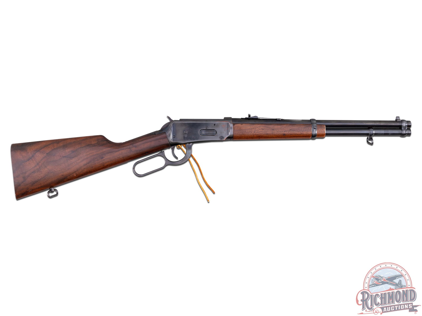 Winchester Model 94 Trapper Carbine in 30-30 Winchester: Made in 1981 by Winchester Repeating Arms. Blued 16" round Winchester Proof Steel barrel with standard sights. Blued solid frame with full magazine and plain trigger with saddle ring. Walnut standard 