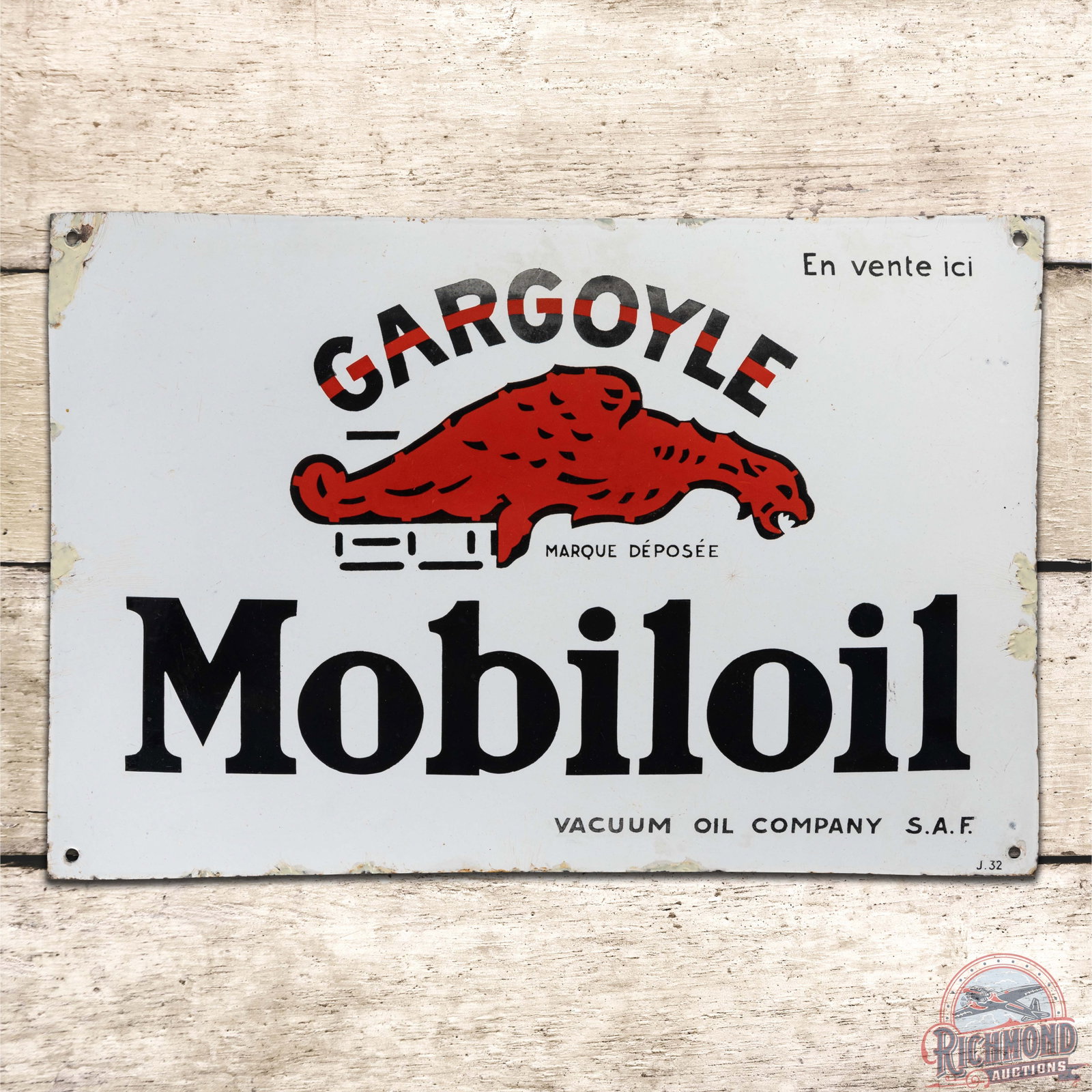Gargoyle Mobiloil Vacuum Oil Company Convex Single Sided Porcelain Sign: SSP (single sided porcelain) convex sign has very good color and gloss. The field exhibits a tiny bruise, minor marks and lower gloss in the upper outer fields. The perimeter has touched up chips alon