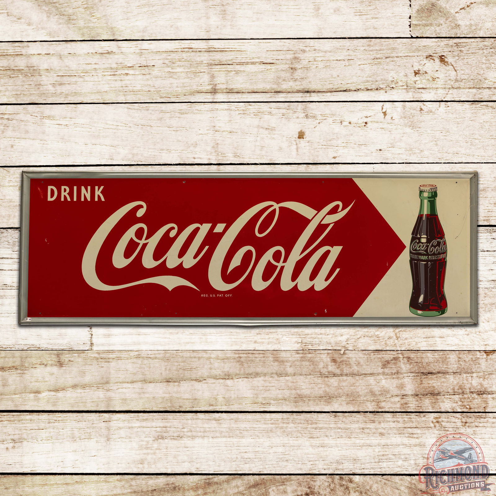 1957 Drink Coca-Cola Single Sided Tin Sign w/ Bottle: SST (single sided tin) self-framed Coke sign has excellent color and shine. The field has light wear with minor spotting in the bottle and scuffs in the outer fields. The perimeter has fine scratches