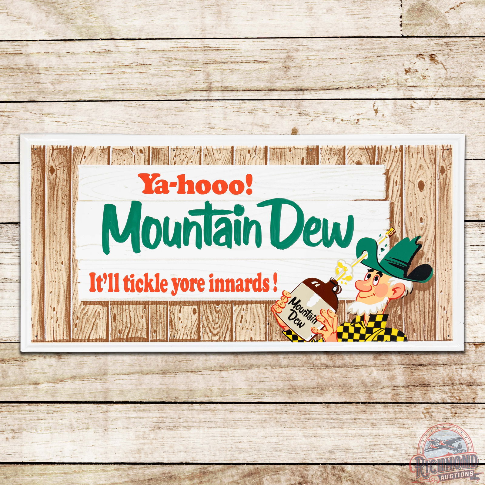 Amazing 1965 Ya-Hooo! Mountain Dew Emb. 3' Single Sided Tin Sign w/ Hillbilly: SST (single sided tin) embossed self-framed sign has outstanding color and shine. The field is very clean overall with minor spotting and a slight horizontal indention in the lower outer field. The pe