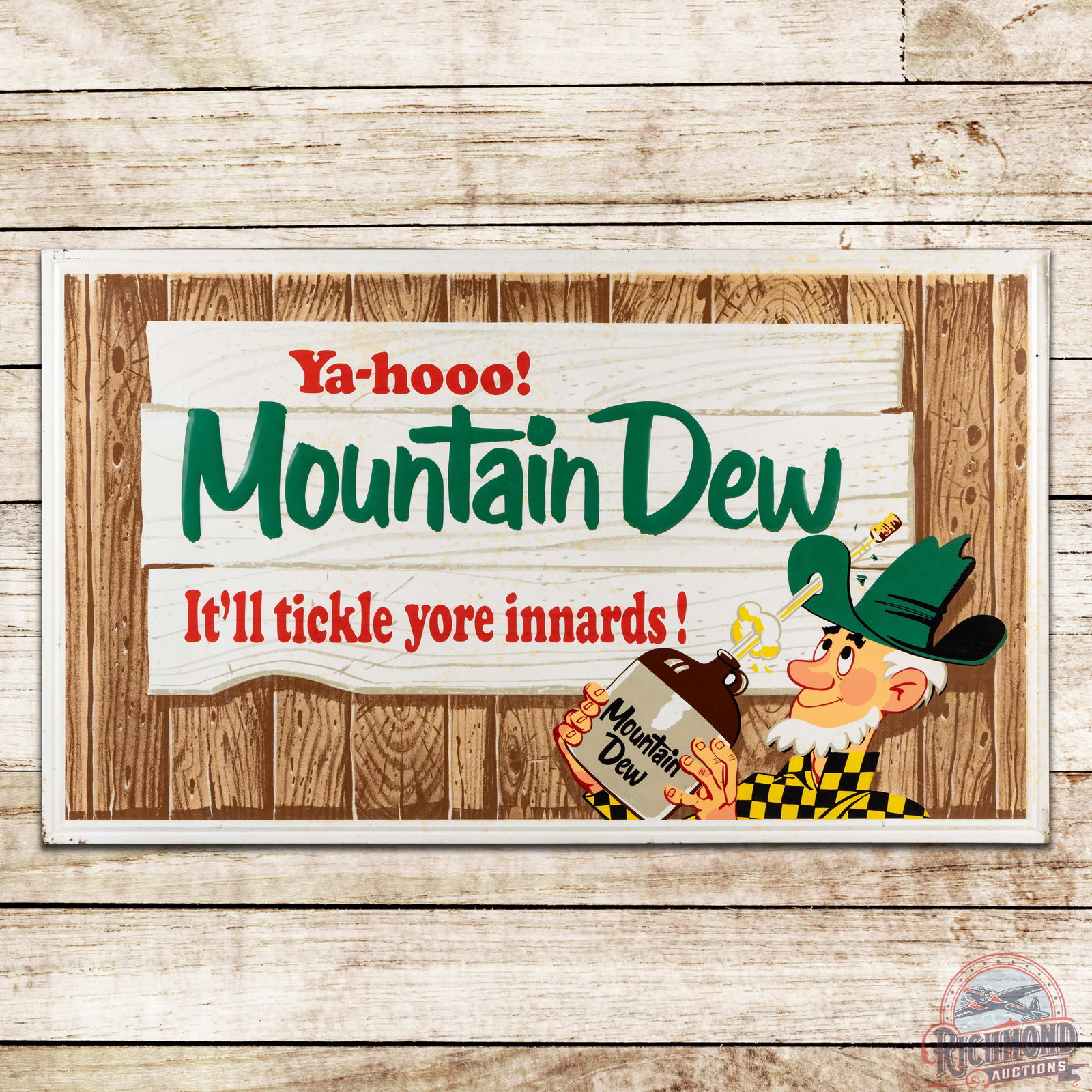 1965 Ya-Hooo! Mountain Dew Emb. 5' Single Sided Tin Sign w/ Hillbilly: SST (single sided tin) embossed self-framed sign with factory wooden support frame has excellent color and shine. The field has areas of discoloration to the white painted background, minor oxidation
