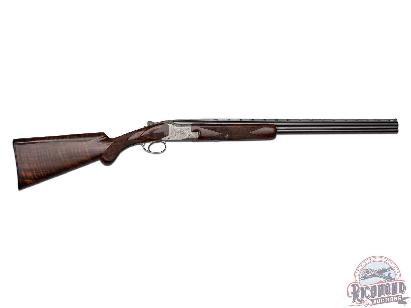 Belgium Browning Superposed Pigeon Grade in 28 Gauge with Modified and Improved Cylinder Chokes: Made in Herstal, Belgium by Browning in 1966. Blued 28 gauge 26-1/4" Browning special steel barrels with ventilated rib, single bead sight, ejectors, 2-3/4" chambers and standard St Louis and Montreal