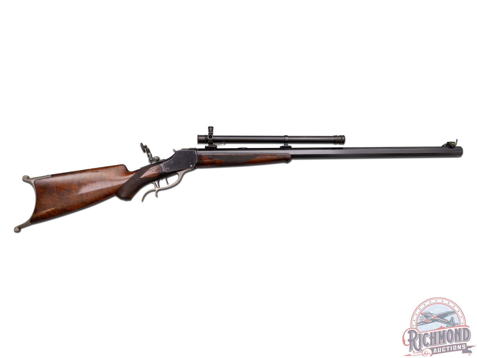 Winchester Deluxe Model 1885 Hi-Wall in 32-40 Caliber with Winchester A-5 Scope: Made by Winchester Repeating Arms Company in 1902. Factory research originally lists this gun with a 36" #3 weight octagon barrel in 38-55 caliber. Rifle is now fitted with a 30" blued #4 weight octag