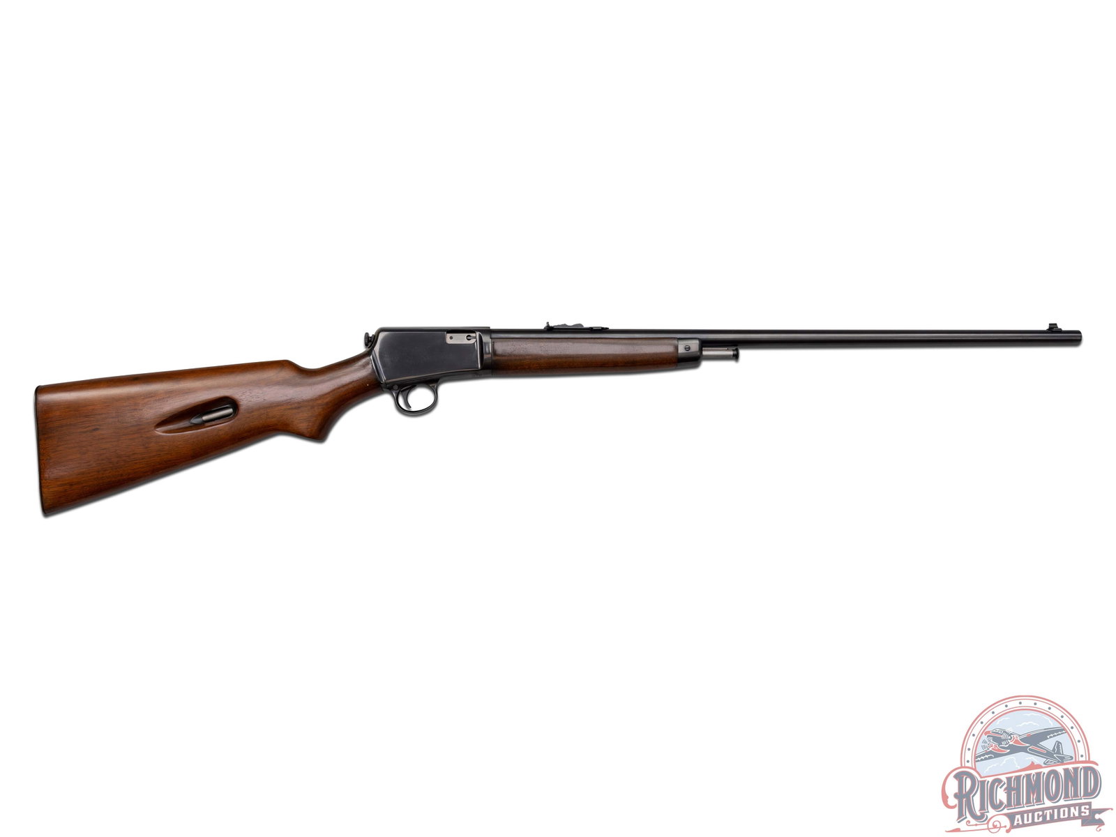 Excellent 1952 Winchester Model 63 .22 LR Semi-Auto Takedown Rifle: Manufactured by Winchester in 1952. This rifle features a 23" blued round barrel with rear notch adjustable and blade front sight. Stamped on the left side "WINCHESTER / TRADE MARK / MADE IN U.S.A / -