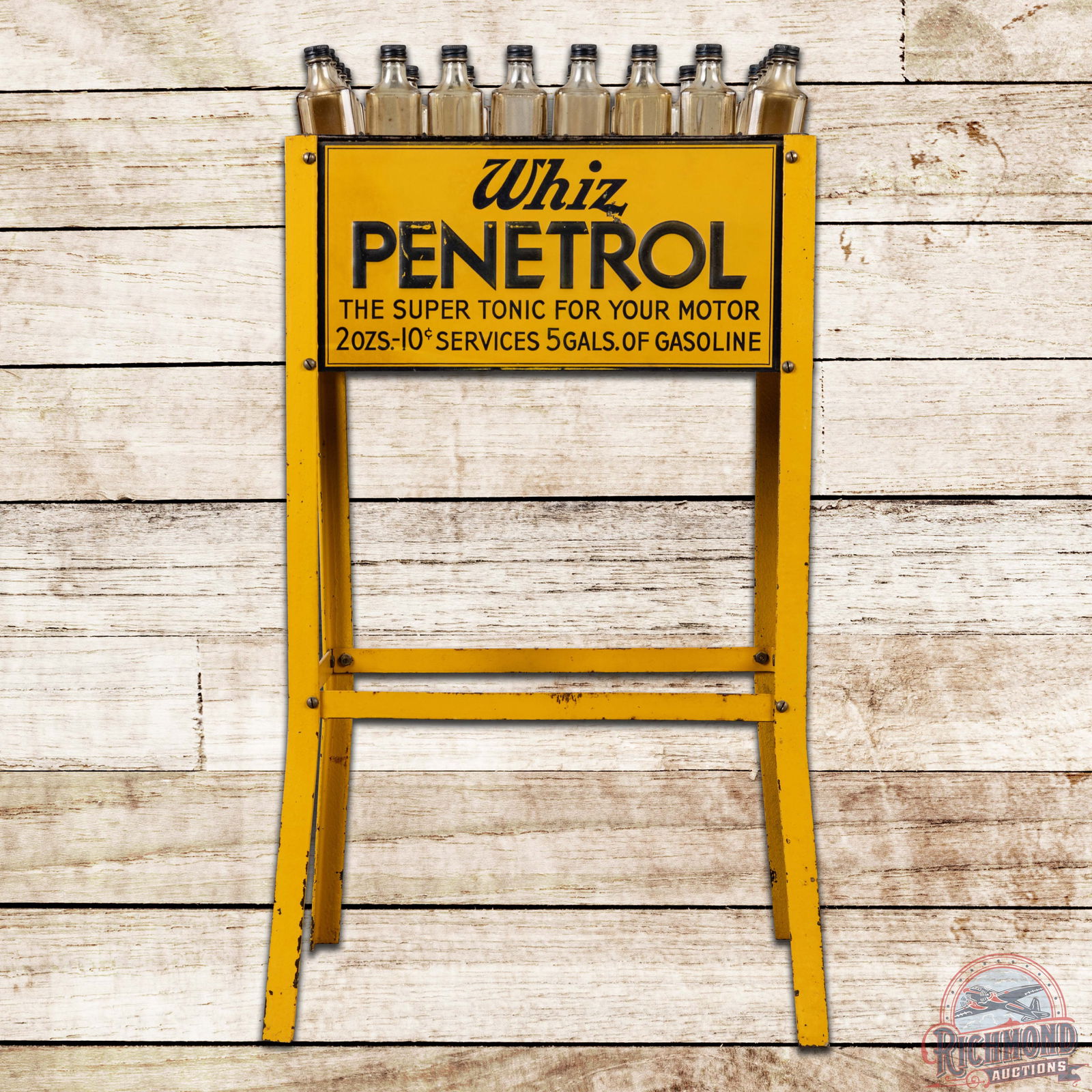 Whiz Penetrol Oil Bottle Display "Super Tonic for Your Motor" w/ Bottles: DST (double sided tin) oil bottle rack with 24 glass bottles with caps has very good color and shine. The rack sign on side #1 has light wear with small paint chips in the fields. The reverse has slig