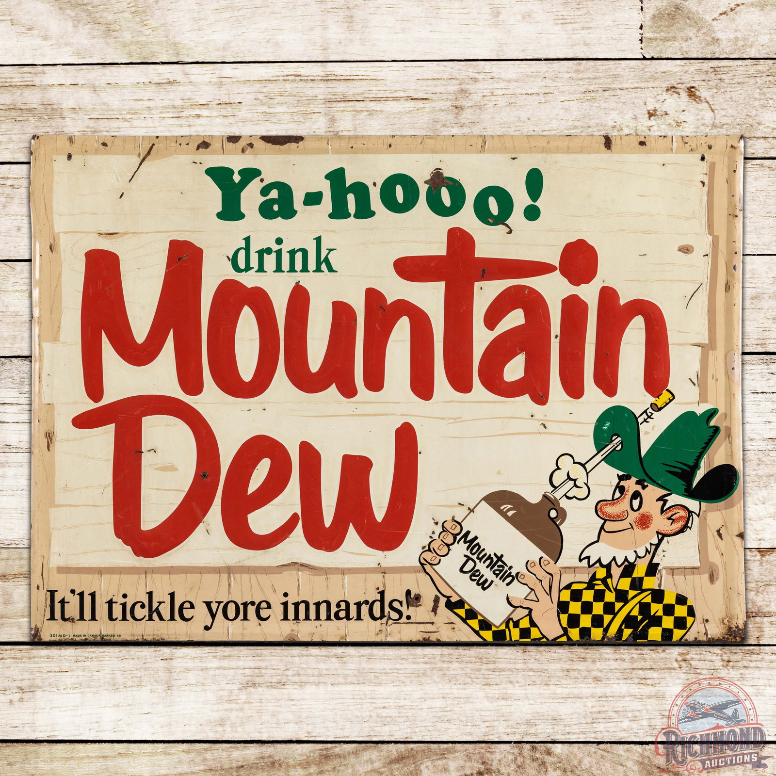 1968 Ya-Hooo! Drink Mountain Dew "It'll tickle yore innards!" Emb Single Sided Tin Sign w/ Hillbilly: SST (single sided tin) embossed self-framed sign has very good color and shine. The field exhibits small paint chips, fine scratches and added mount holes. The perimeter has minor edge bends, larger p