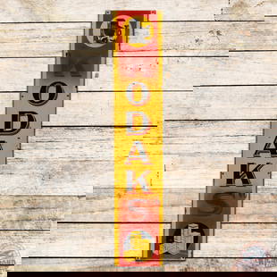 Kodak Verichrome Camera Film Vertical Single Sided Porcelain Sign: SSP (single sided porcelain) rolled edge sign has very good color and gloss. The field has light wear with small chips. The perimeter has light wear at the mount holes with chips and minor crazing to