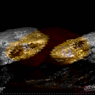 27.45 g Gold Nugget: This nugget weighs 27.45 grams and has a natural purity of 92%. It was uncovered at a remarkably rich mine in remote Western Australia - a site with a long and storied history, having been opened and