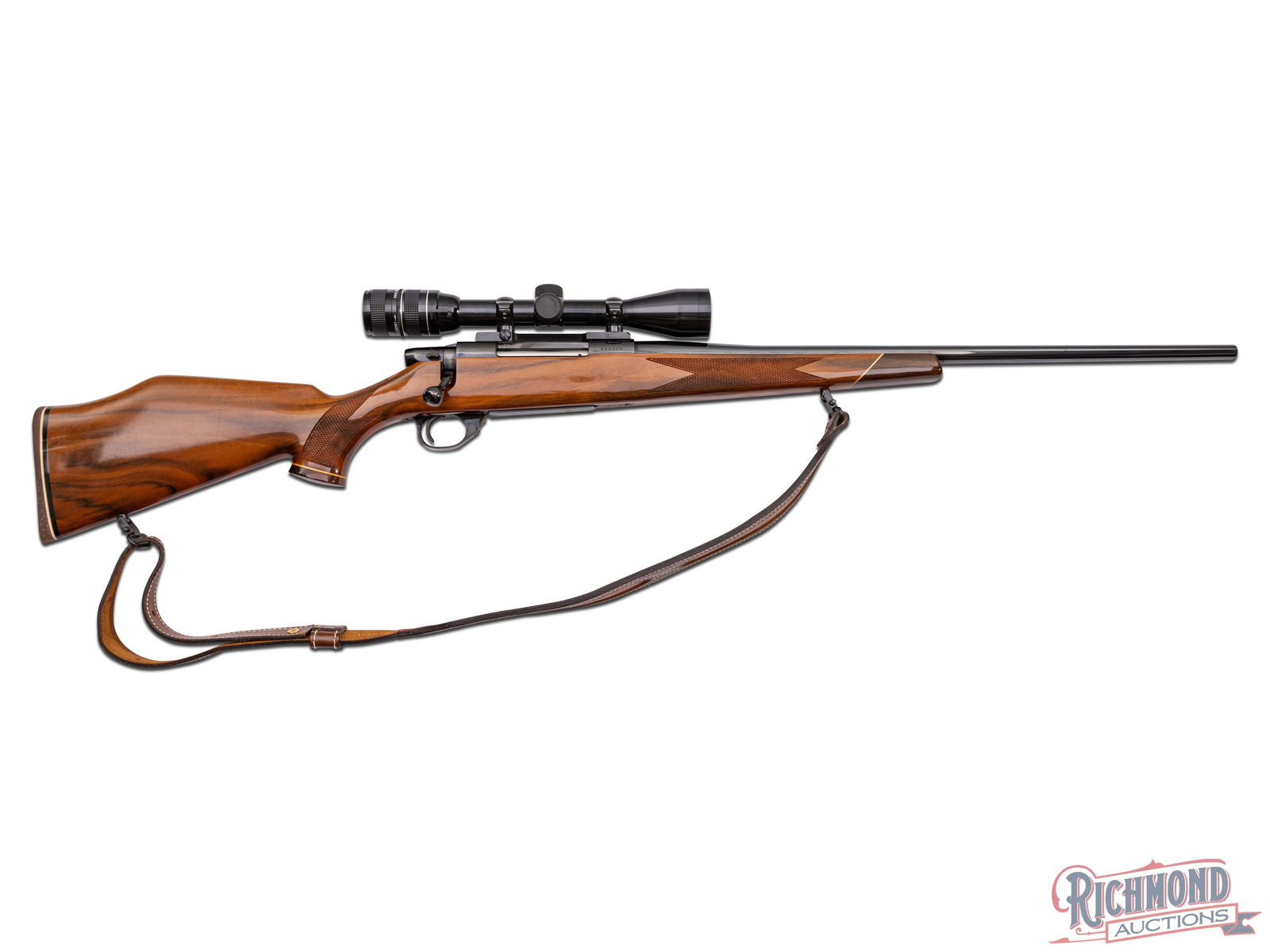 1975 Weatherby Vanguard .300 WIN MAG Bolt Action Rifle with Premier Scope: Manufactured circa 1975 by Weatherby in Japan. Features a 24" blued tapered, and sightless barrel chambered for the big game .300 WIN Magnum cartridge. Vanguard action is a modified Mauser action with