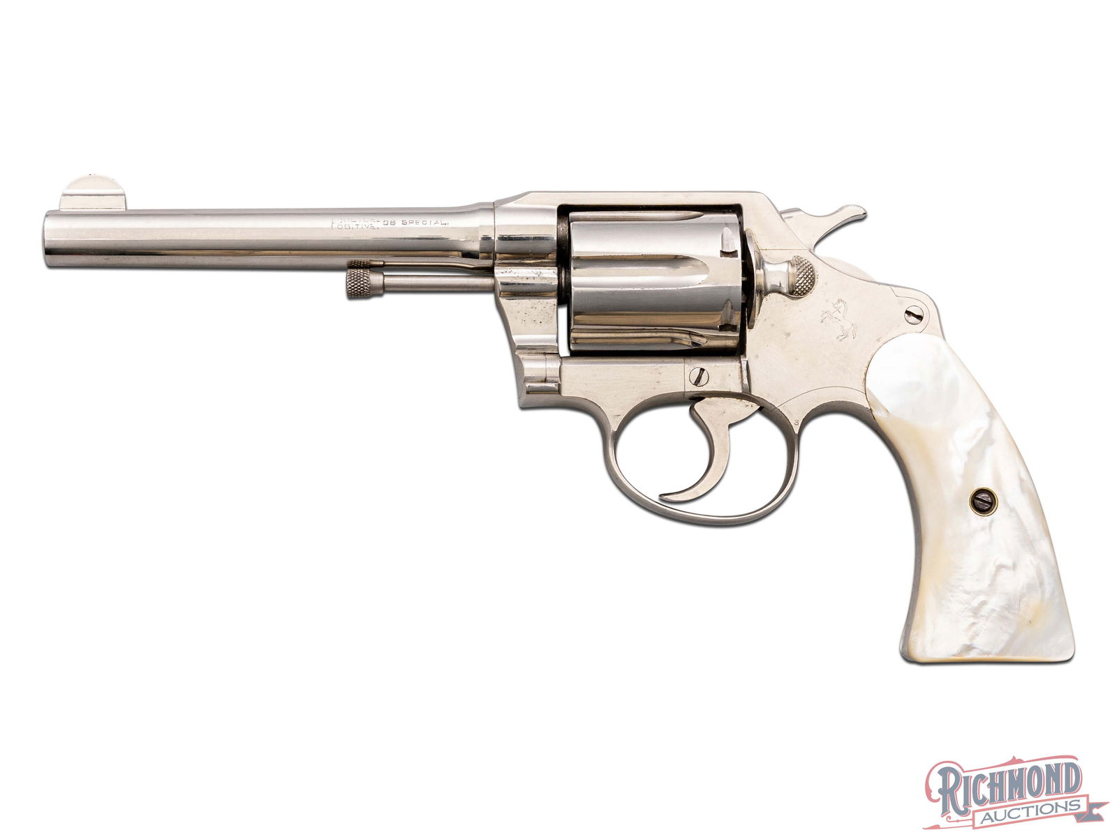 1925 Colt Police Positive .38 Special 5" Nickel Revolver with Mother of Pearl Grips: Manufactured by Colt in 1925. Features a 5" barrel with rear integrated notch and half-moon front blade. Left side of the barrel is stamped "POLICE/POSITIVE/38 SPECIAL" and the top is stamped with a t