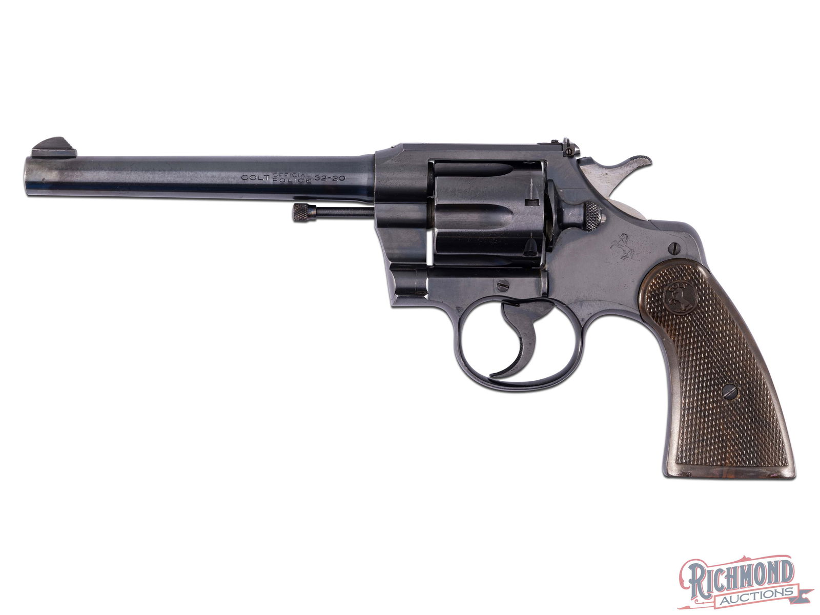 1933 Colt Official Police 32-20 WIN Double Action 6" Revolver: Manufactured in 1933. This well-kept Police features a 6" tapered barrel with rear adjustable notch sight and blade front sight. Left side is stamped "COLT / OFFICIAL POLICE / 32-20". Blued finish wit