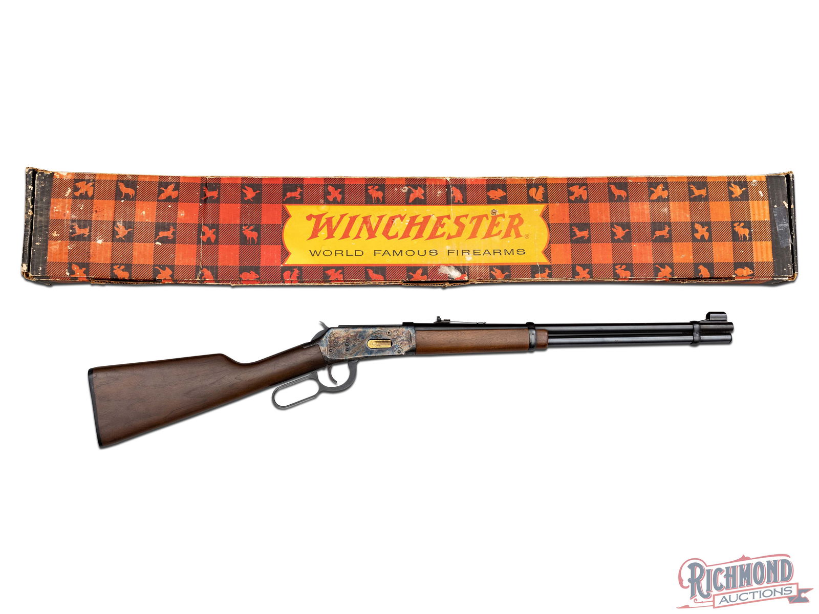 1972 Winchester 94 Antique Carbine .30-30 WIN Case Hardened Lever Action Rifle in Factory Box: Manufactured by Winchester in 1972. Features a 20" blued round Winchester Proof Steel barrel with rear adjustable notch sight and hooded front blade sight. Lever action with full barrel length magazin