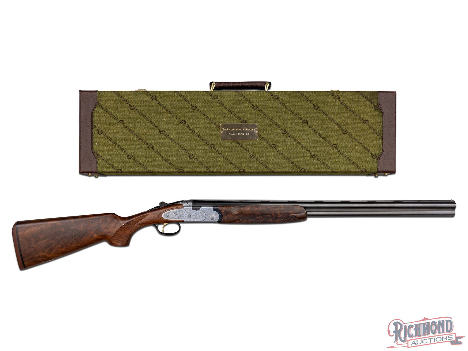 Cased 1988 P. Beretta 687 DU 20 GA Ducks Unlimited Over/Under Shotgun: Manufactured in 1988 by Beretta in Italy. Features 26-1/2" ventilated rib barrels with brass bead sight. Chambered for 3" shells with Cylinder chokes. Includes 3 additional Beretta screw-in choke tube