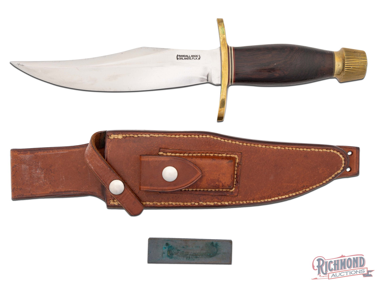 Randall Made Model 12 Bear Bowie 8" Knife with Exotic Wood Handle & Leather Sheath: Manufactured by Randall Made in Orlando, FL. Designed for big game sportsman who use it for hunting. This bowie features an 8" clip point blade of 1/4" stock, 1-5/8" width. The top cutting edge is sha