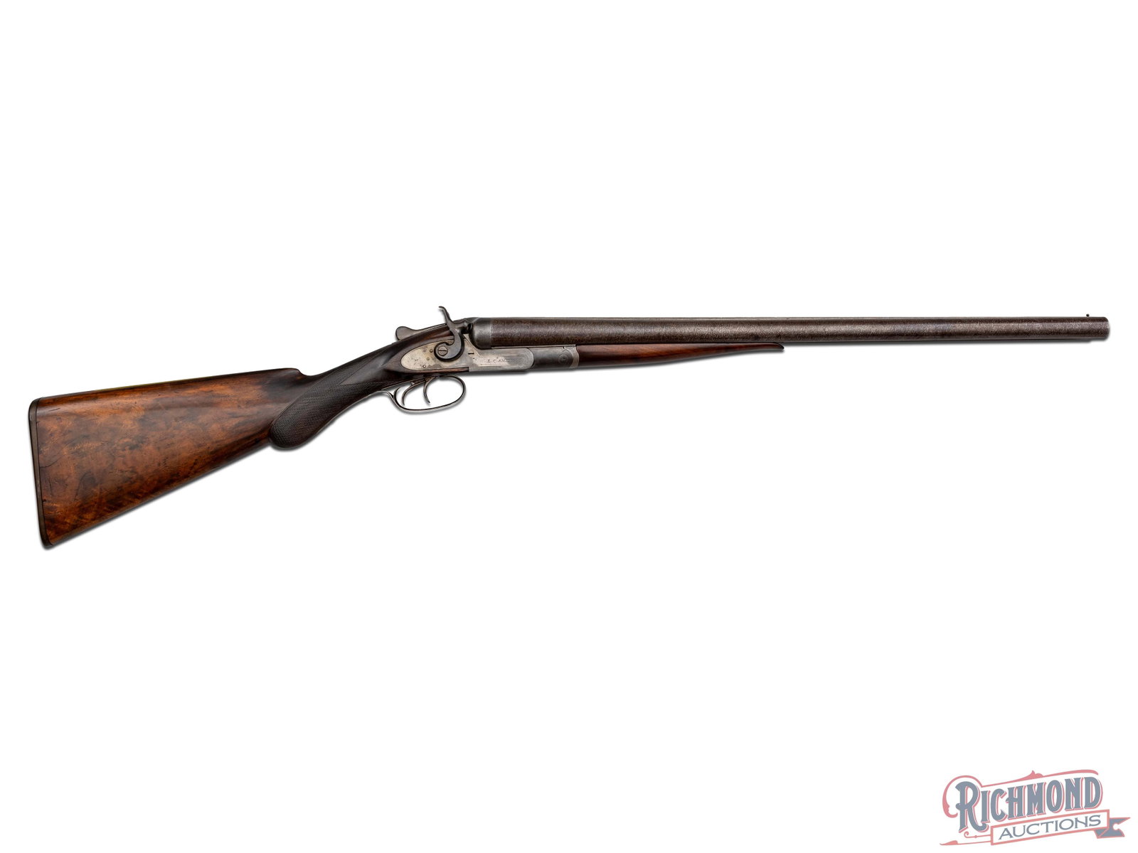 Antique LC Smith Field Grade Hammer Gun 12 GA Grade 1 SxS Shotgun: Manufactured by LC Smith. Field grade indicated by "F" on the water table. Features cut-down 23" Damascus barrels with brass bead front sight. Early scalloped frame receiver with extractors, double ha