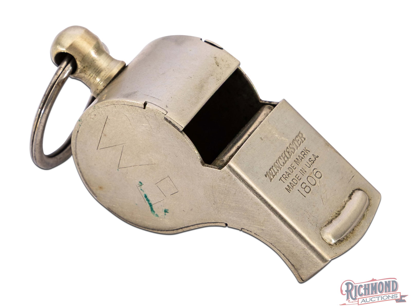 1920's Winchester Model 1806 Referee Sport's Whistle: Manufactured by Winchester circa 1920's. Police type whistle, nickel plated with lanyard loop. Stamped on the top with the Winchester trademark and model "1806". Initials "RK" and "WS" lightly scratch