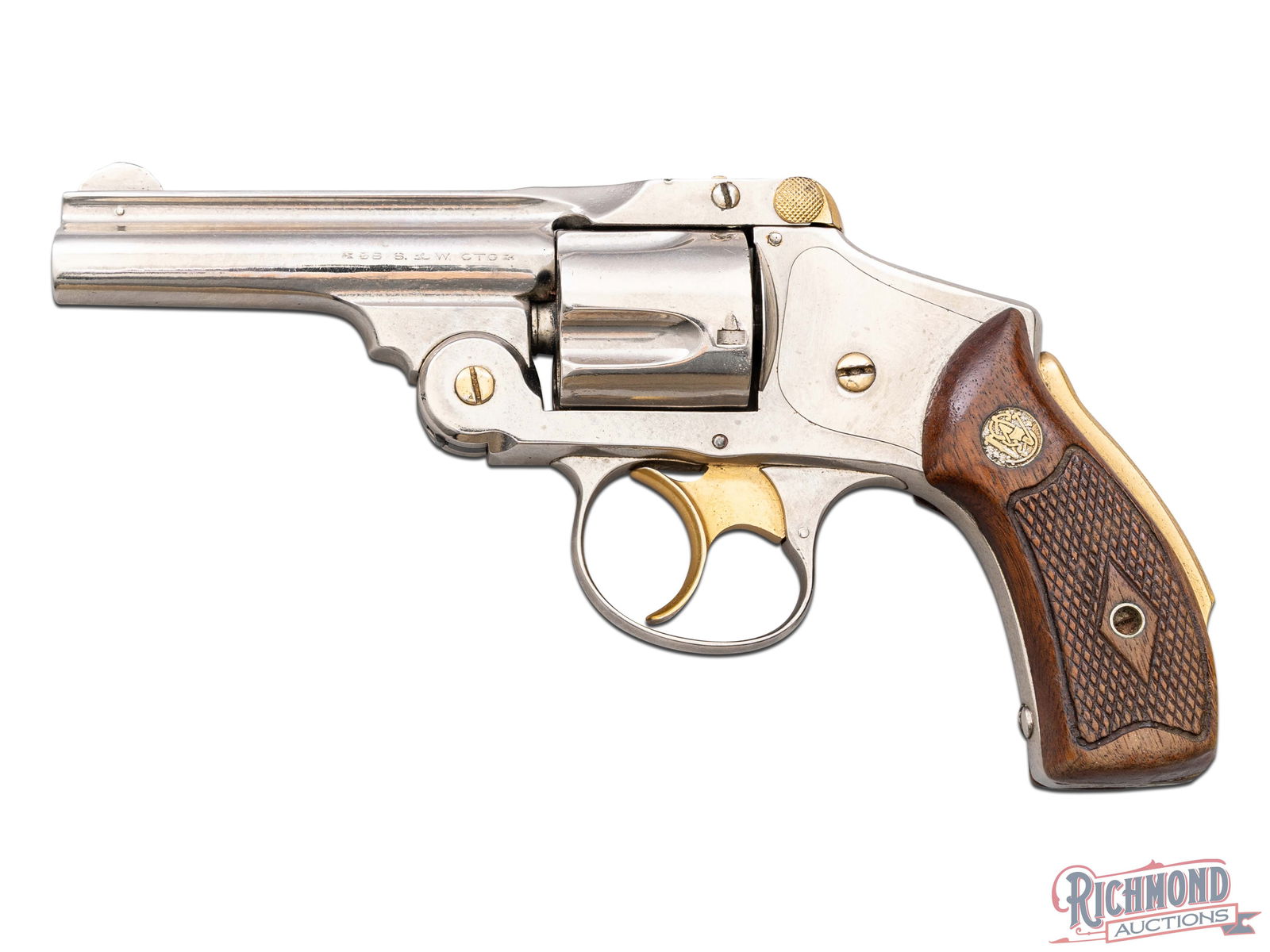 Early 1900's Smith & Wesson 38 Safety Hammerless .38 S&W "Lemon Squeezer" DA Revolver: Manufactured by Smith and Wesson in the early 1900's. This fourth model features a 3-1/4" solid rib barrel with rear notch and half-moon pinned front sight. Nickel finish with gold washed trigger, top
