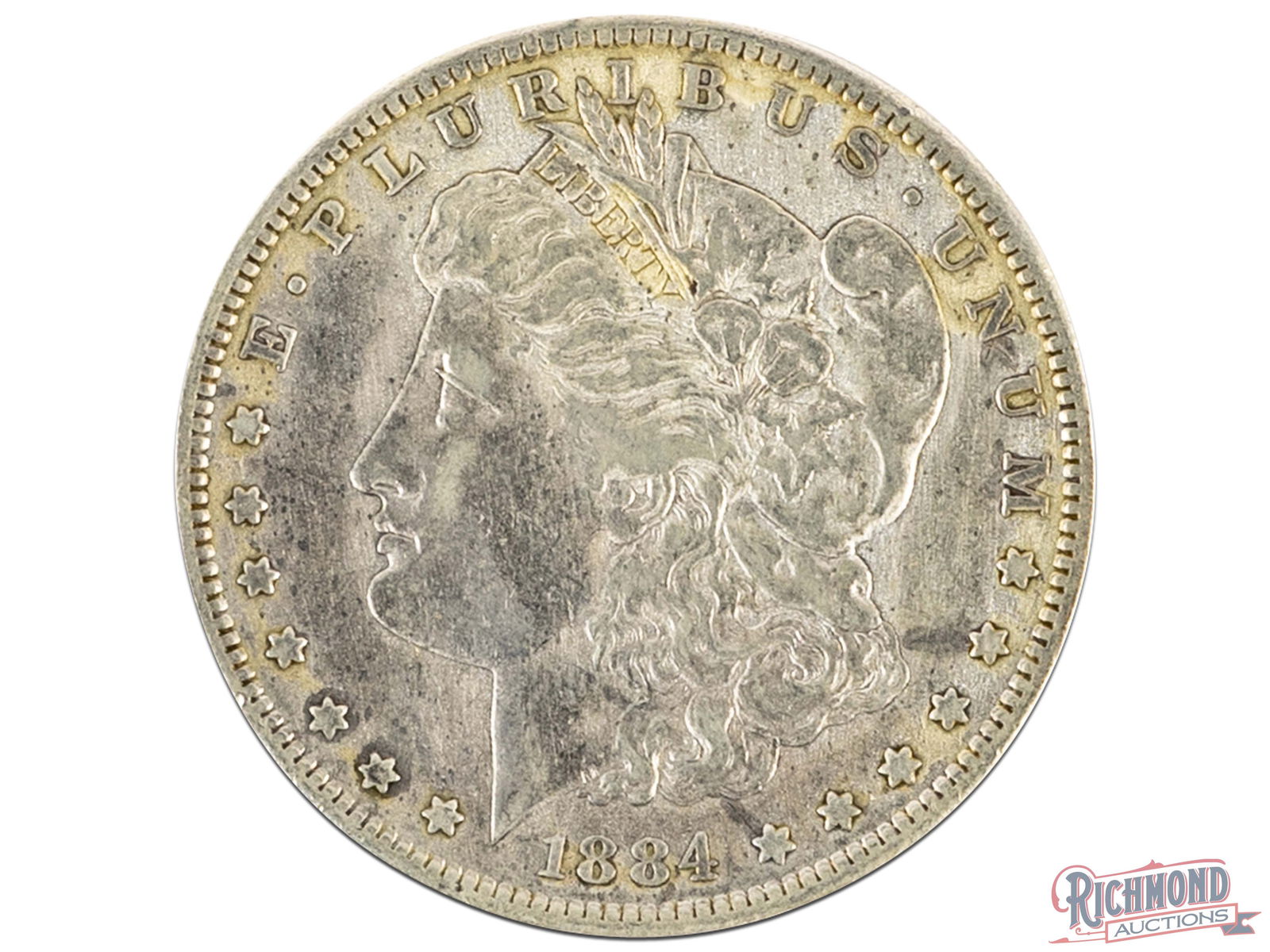 Fine Condition 1884-S Silver Morgan Dollar: This present coin presents a great opportunity to own a key date coin without dolling out thousands of dollars to do so. The 1884-S is a conditional rarity, meaning that it is common in lower grades,