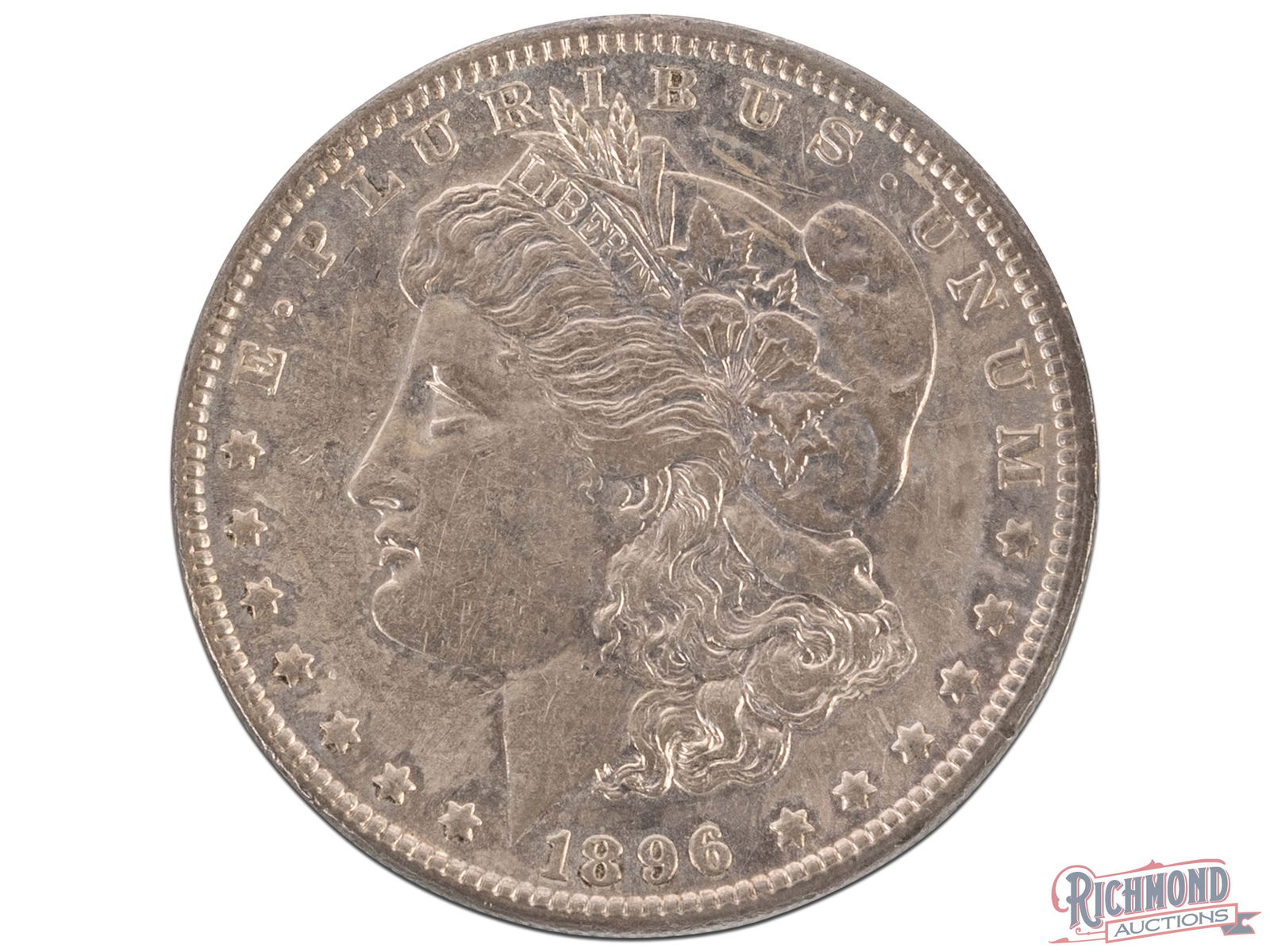 1896 $1 Morgan Silver Dollar Slider for High-Grade Album: This 1896 Philadelphia Mint About Uncirculated Morgan Dollar is a pleasing example that could sneak into an Uncirculated holder on a good day. This coin is much more pleasing than most examples we see